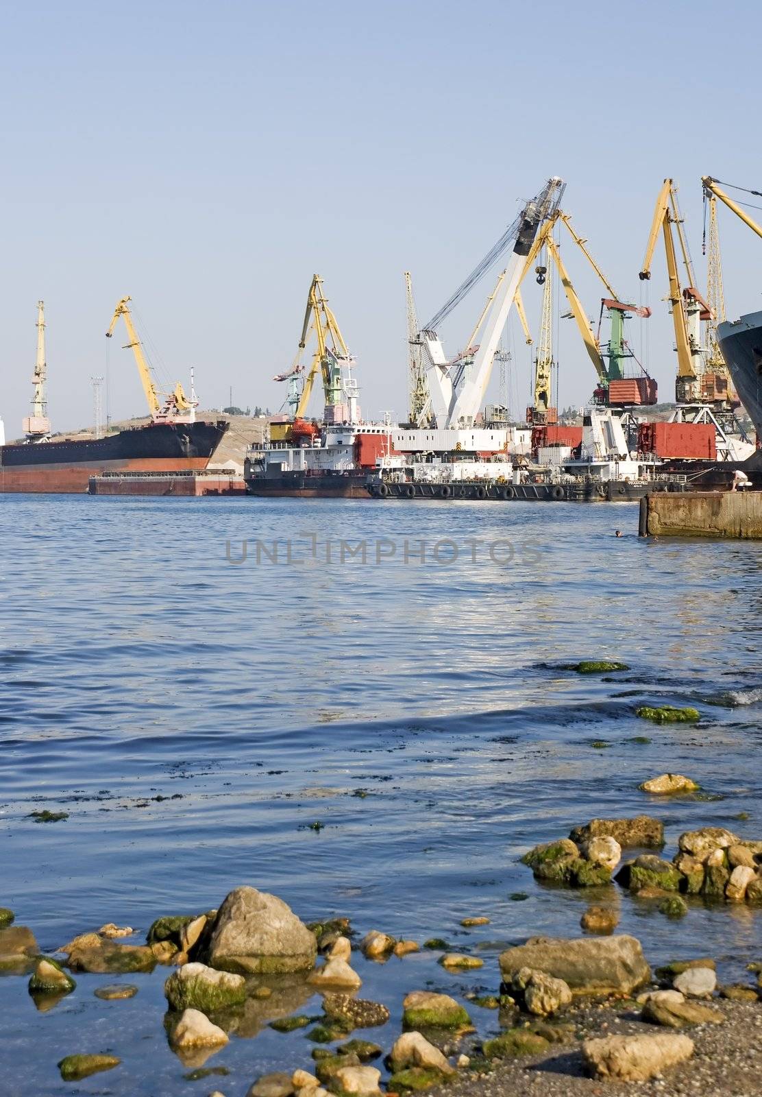 Seaport c stones at ocean in the foreground