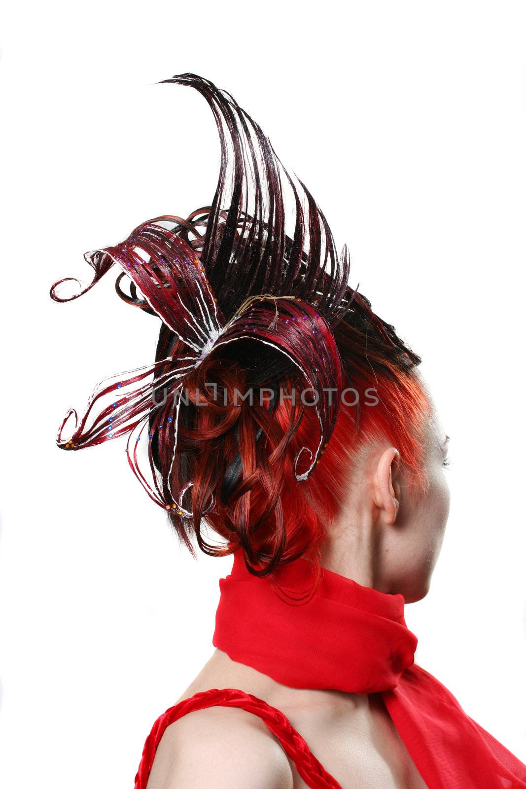 Portrait of the young woman with a creative hairdress