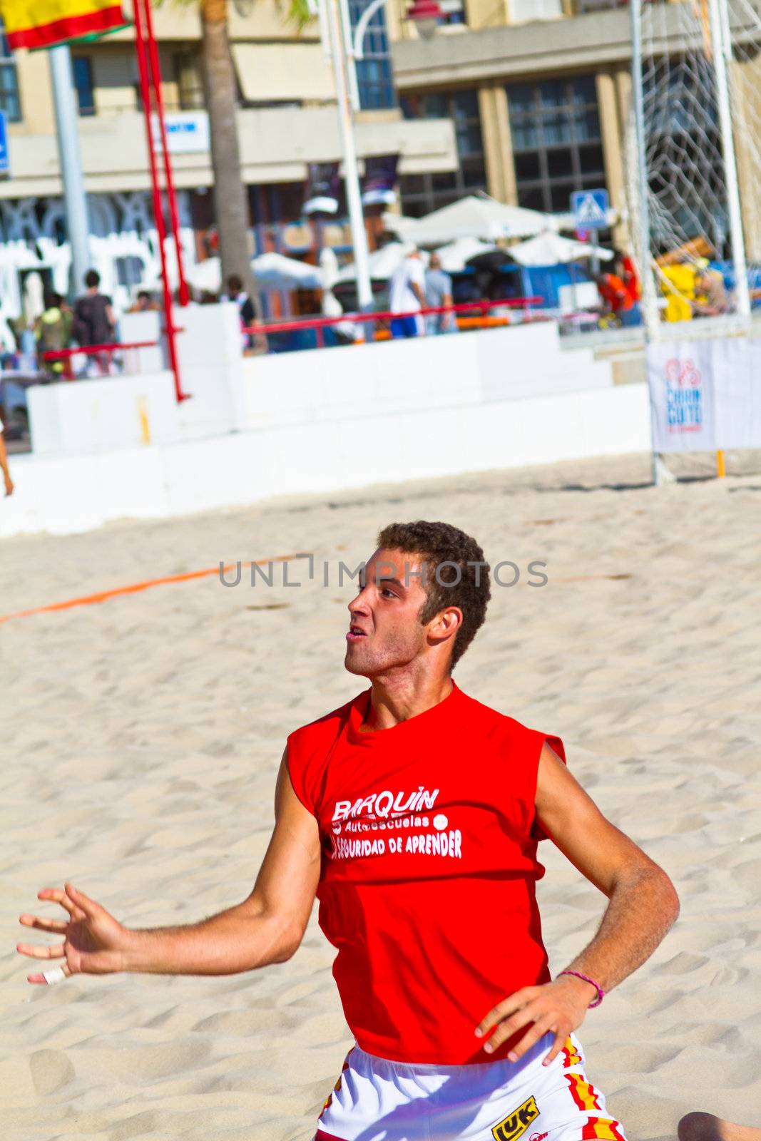 CADIZ, SPAIN - JULY 19: Unidentified players compete in a match between Autoescuela Barquin and CadizSur Seguros BMPY in the 19th league of beach handball of Cadiz on July 19, 2011 in Cadiz, Spain