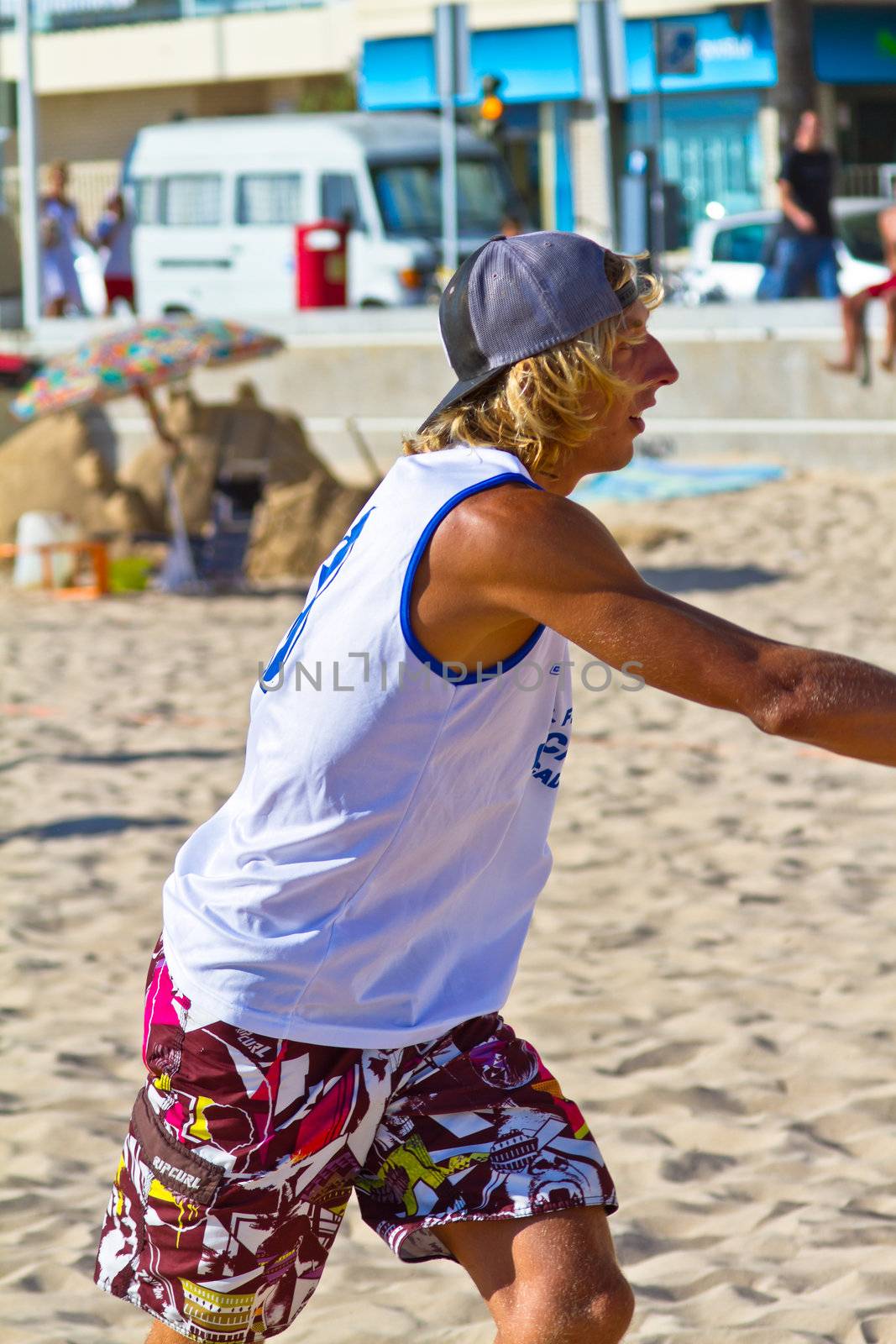 CADIZ, SPAIN - JULY 19: Unidentified players compete in a match between Valcarcel Recuperado and DecoHogar in the 19th league of beach handball of Cadiz on July 19, 2011 in Cadiz, Spain