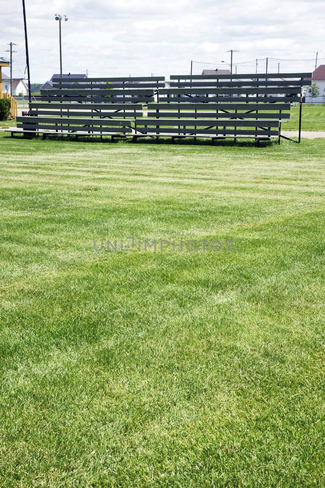 Bleachers and grass by Mirage3