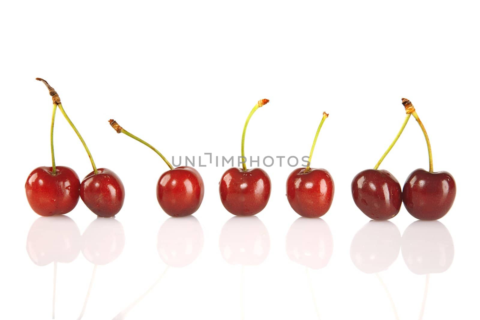 Sweet red cherries isolated on a white background