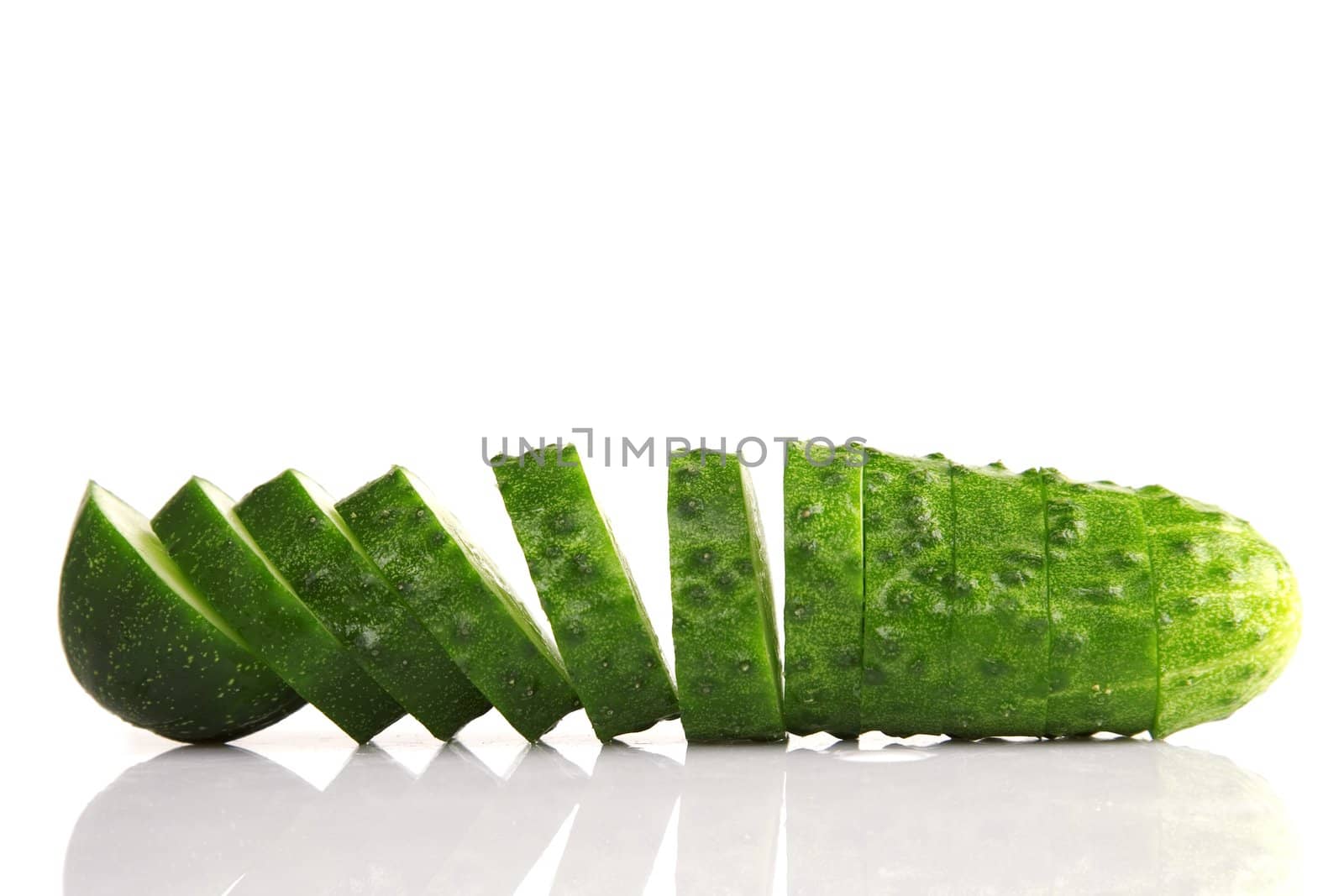 front view of cucumber slices isolated on white 