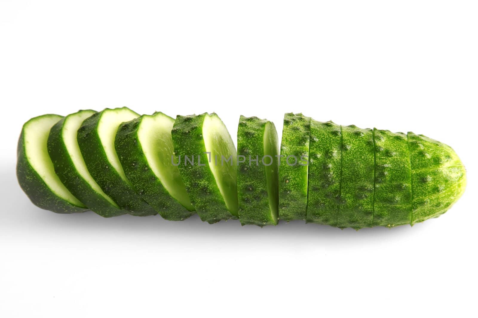 front view of cucumber slices isolated on white