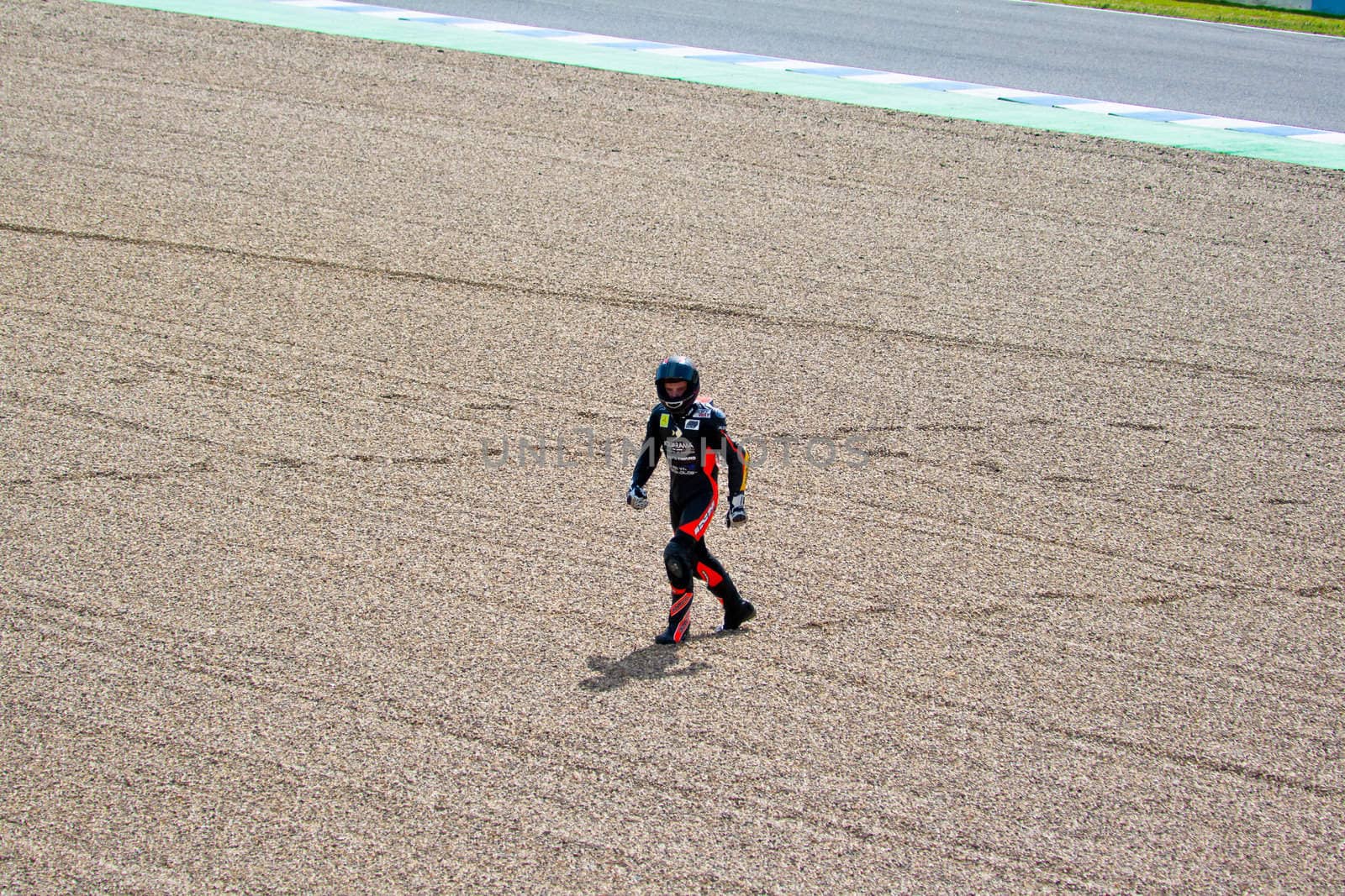 JEREZ DE LA FRONTERA, SPAIN-MAR 5: 125cc motorcyclist Daniel Kartheininge after an accident on the official training of the world championship of MotoGP on March 5, 2011 in Jerez de la Frontera, Spain