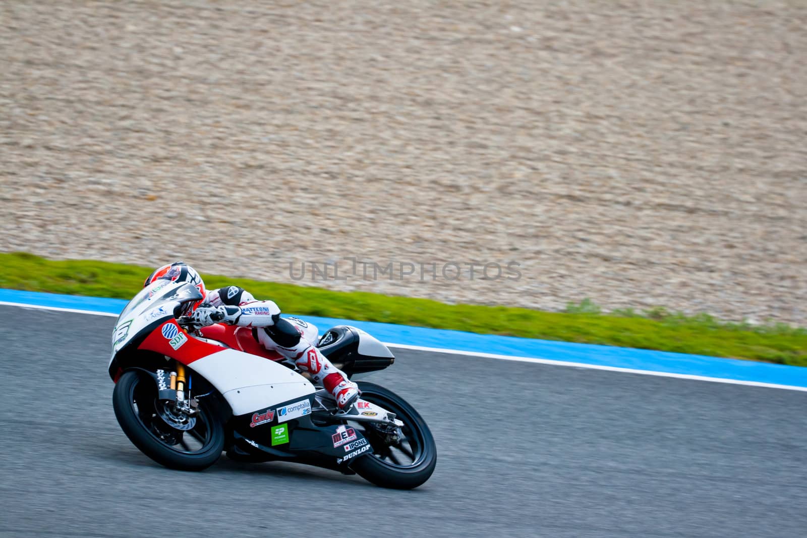 JEREZ DE LA FRONTERA, SPAIN - MAR 5: 125cc motorcyclist Louis Rossi races on the official training of the world championship of MotoGP on March 5, 2011 in Jerez de la Frontera, Spain