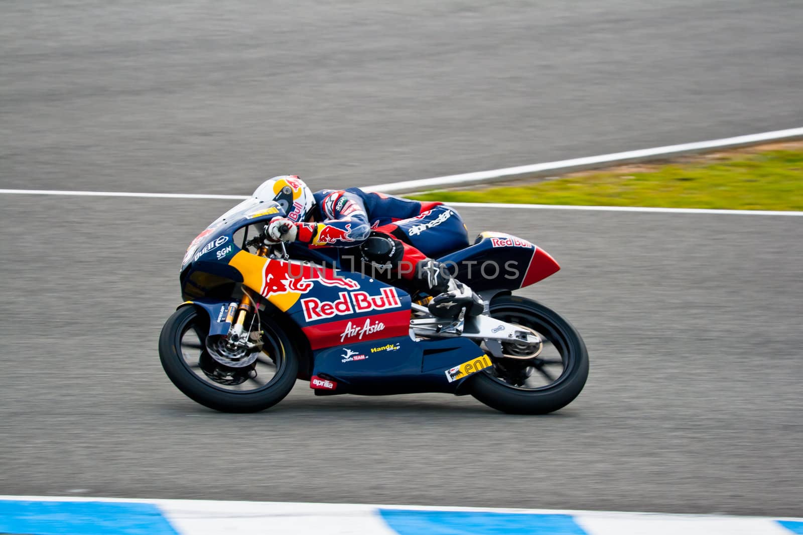 JEREZ DE LA FRONTERA, SPAIN - MAR 5:125cc pilot Jonas Folger takes a curve on the official training of the world championship of MotoGP on Mar 5, 2011, in Jerez de la Frontera, Spain