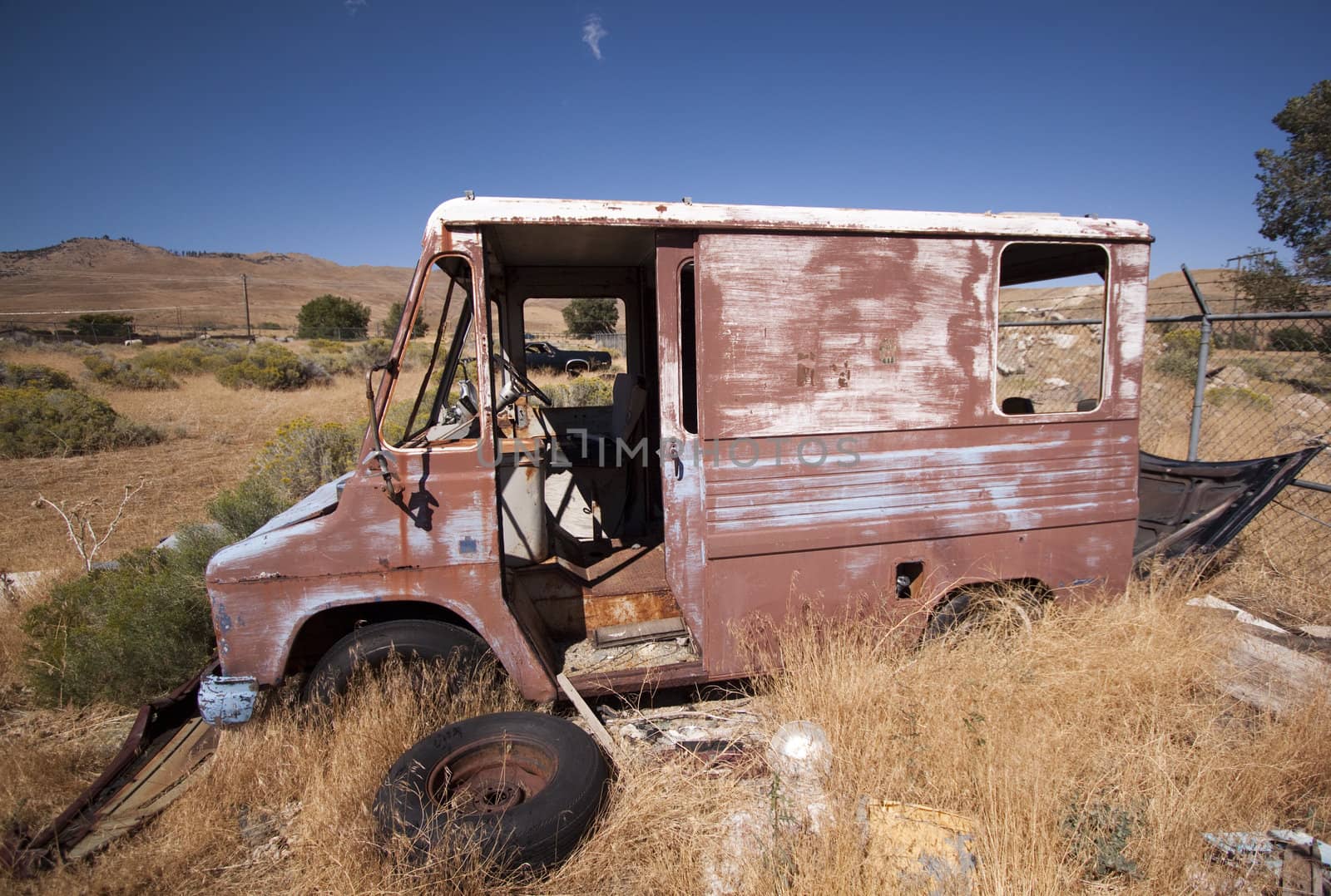 An old rusty abandoned car.