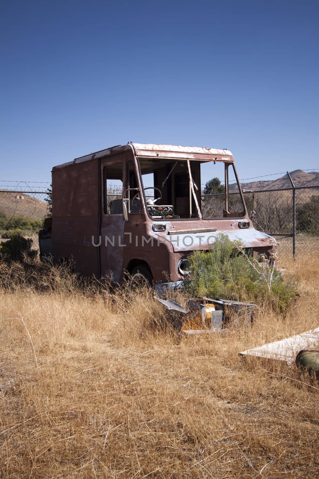 An old rusty abandoned car.