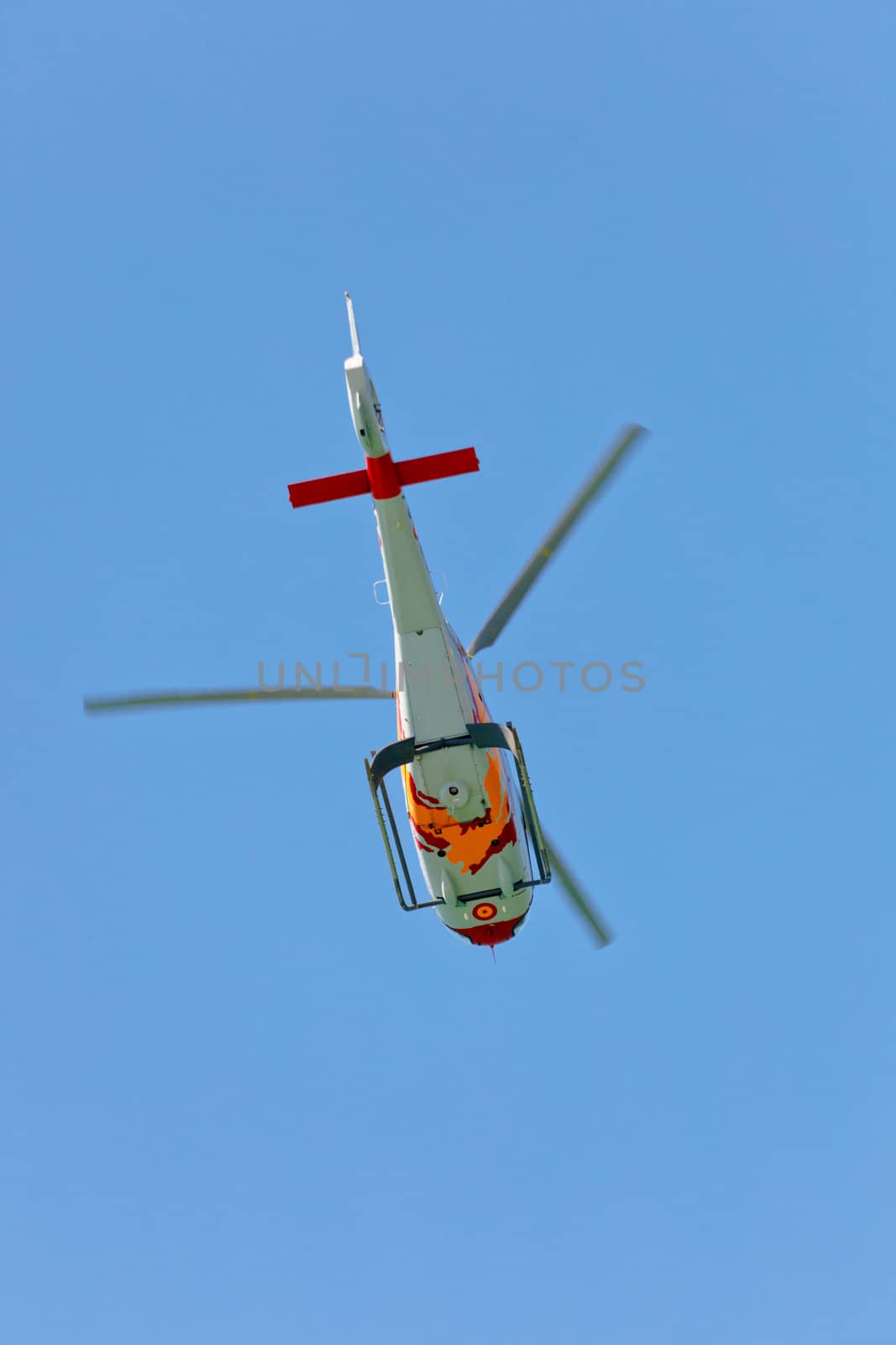 CADIZ, SPAIN-SEP 12: Helicopters of the Patrulla Aspa taking part in an exhibition on the 3rd airshow of Cadiz on Sep 12, 2010, in Cadiz, Spain