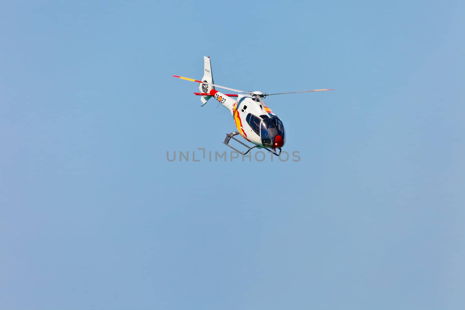 CADIZ, SPAIN-SEP 12: Helicopters of the Patrulla Aspa taking part in an exhibition on the 3rd airshow of Cadiz on Sep 12, 2010, in Cadiz, Spain