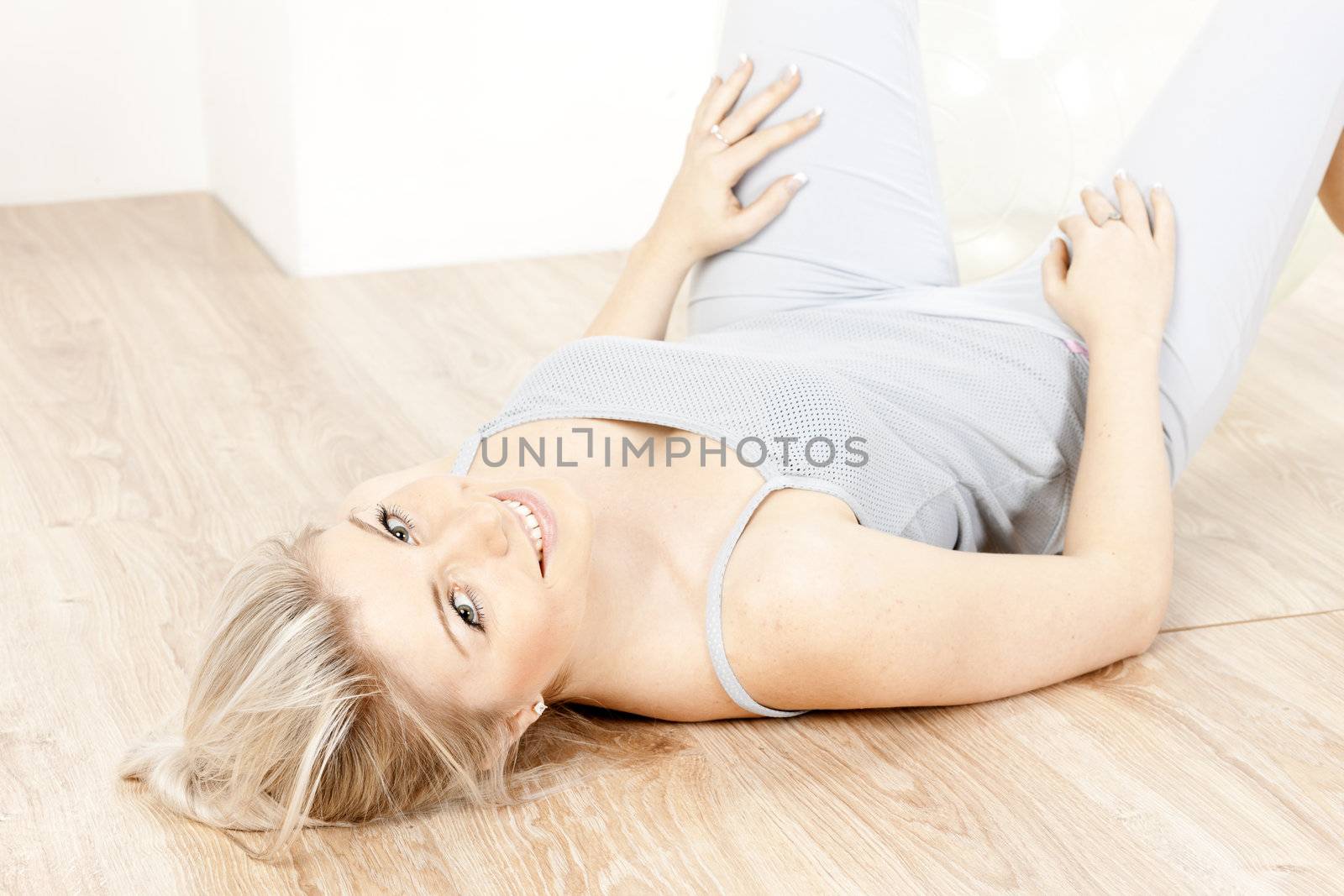 portrait of young woman doing excercises