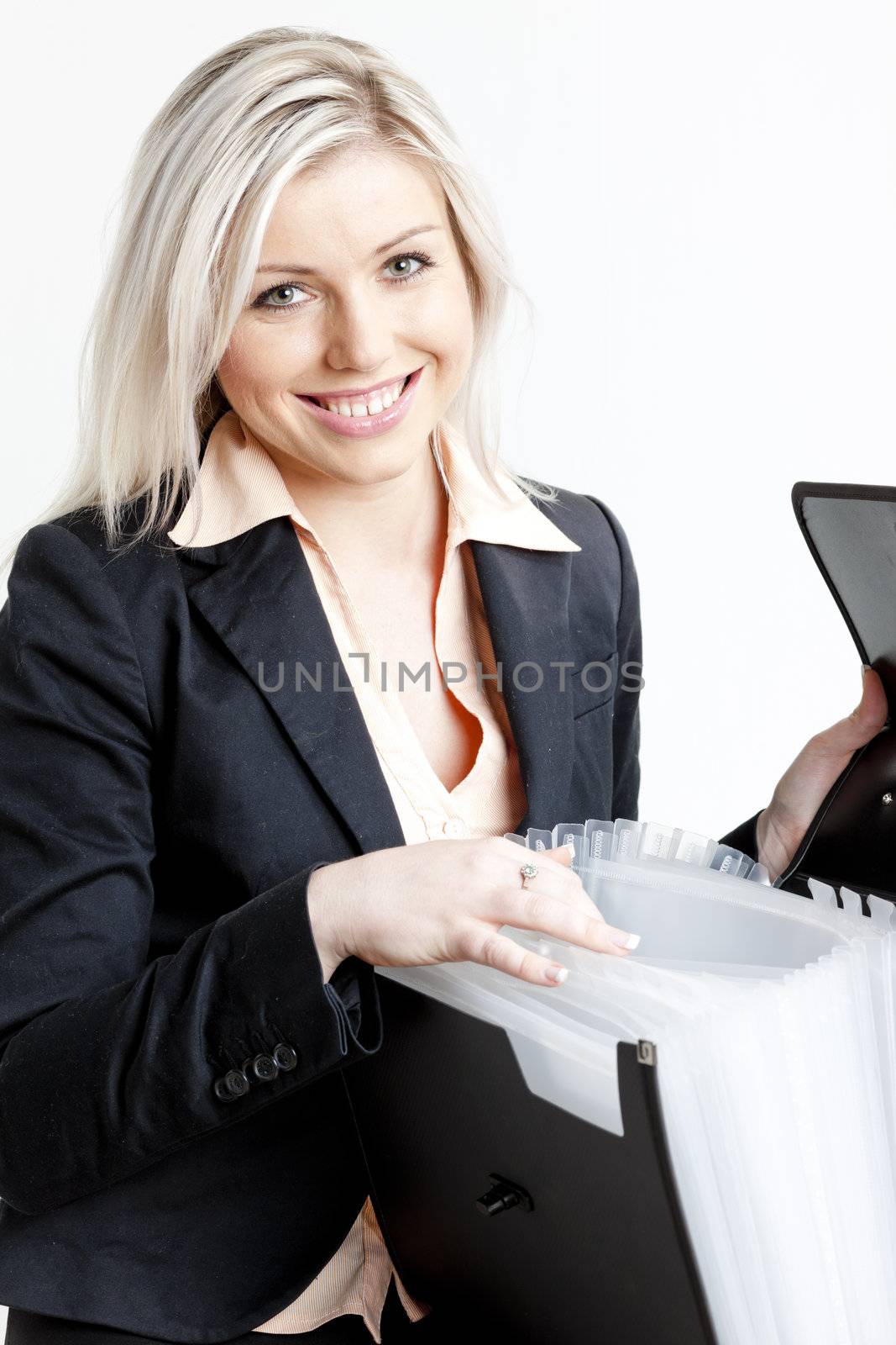 portrait of young businesswoman with folders by phbcz