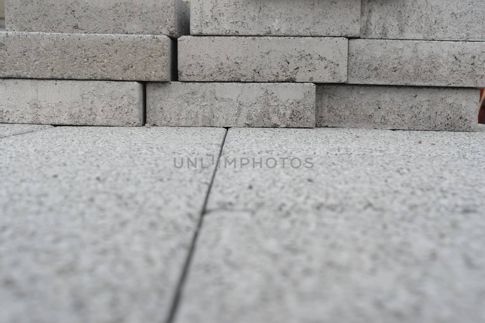 roadworks with cobblestones at a building site..