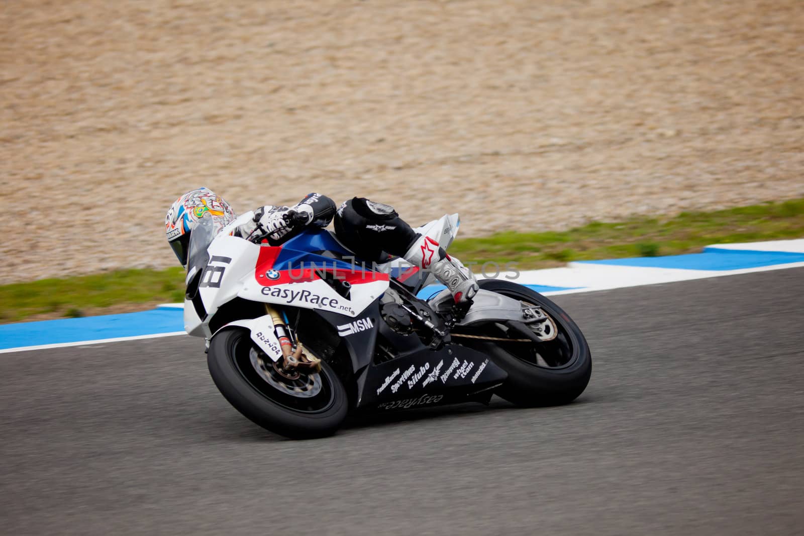 JEREZ DE LA FRONTERA, SPAIN - NOV 20: Stock Extreme motorcyclist Eduardo Salvador takes a curve in the CEV championship on Nov 20, 2010, in Jerez de la Frontera, Spain