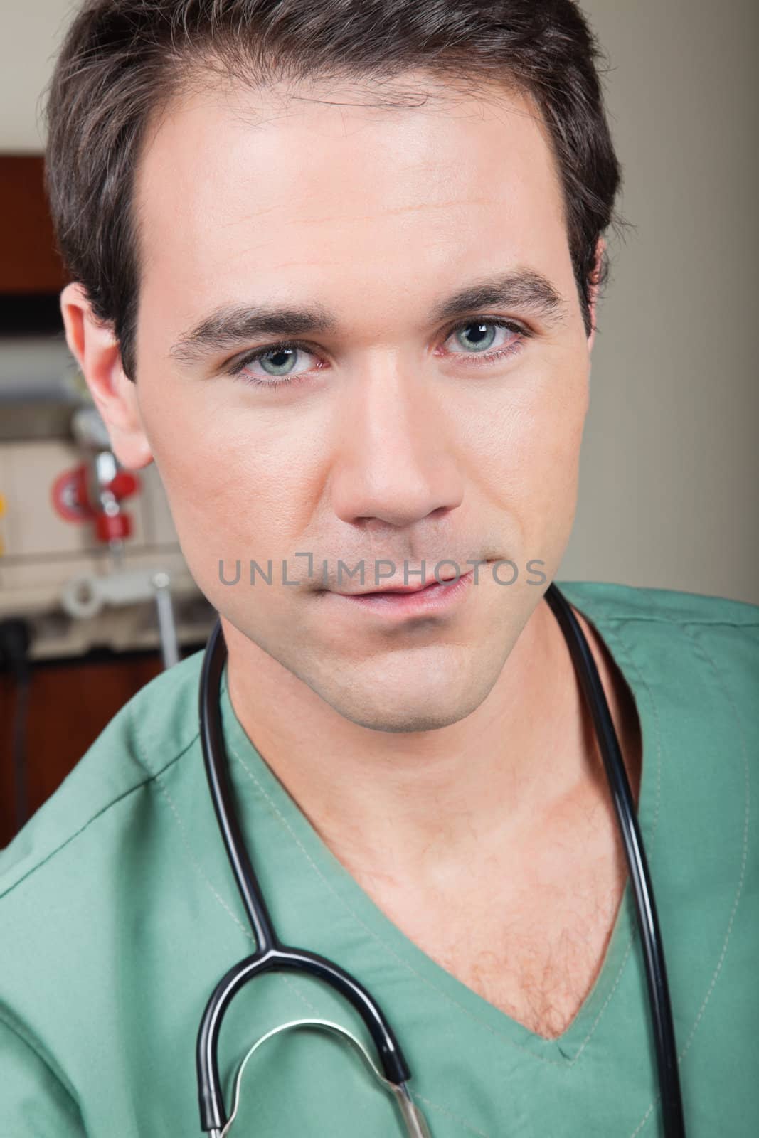 Close-up portrait of young male surgeon