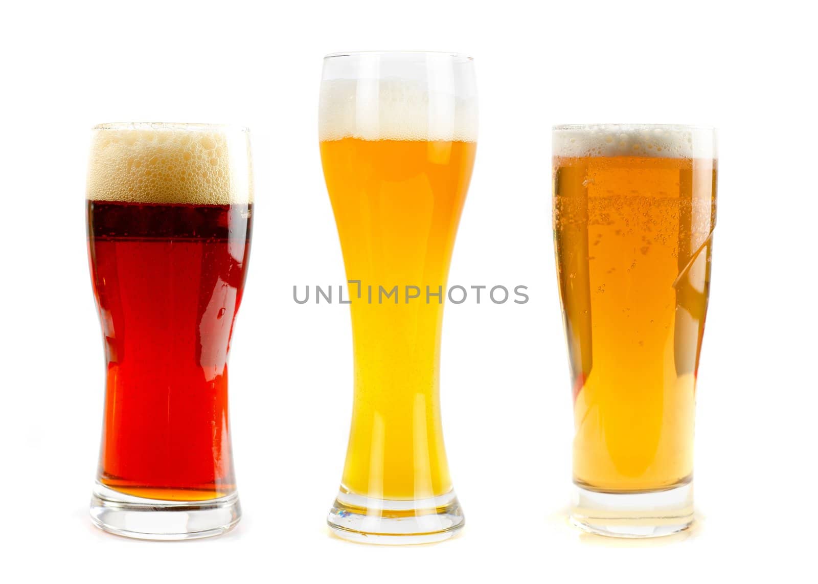 Set of different kind of beer at glasses isolated on a white background