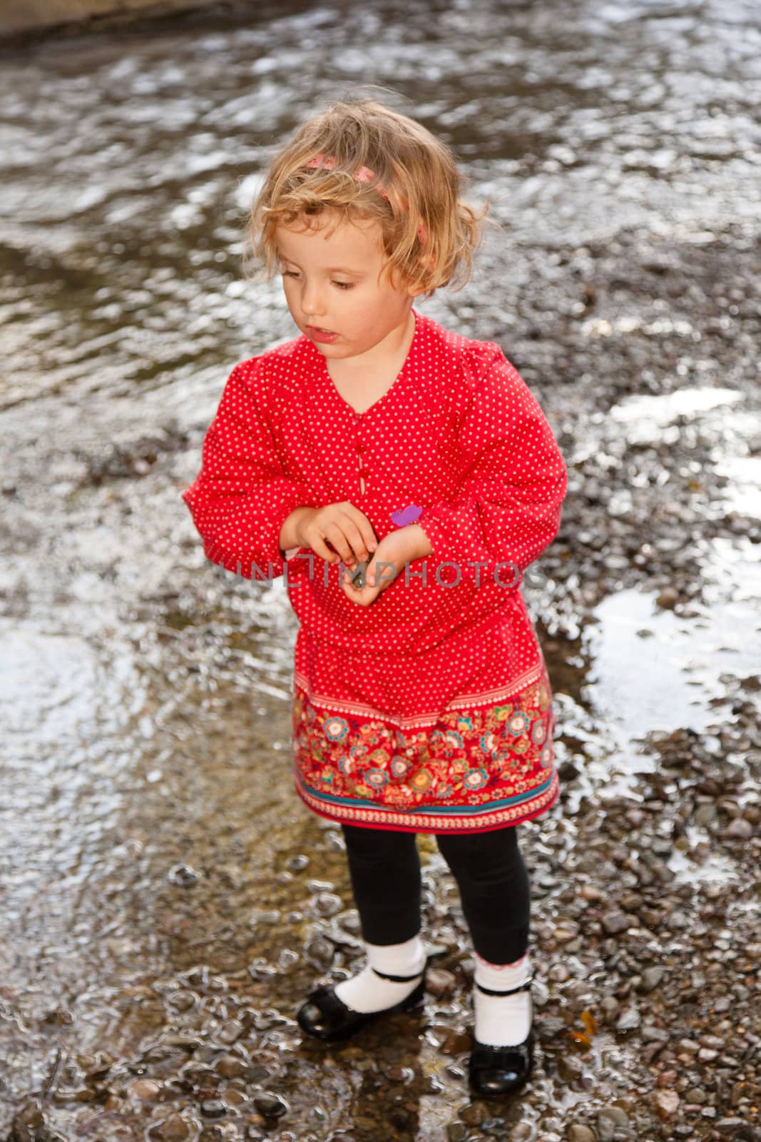 Having fun walking in the park on Sunday afternoon.