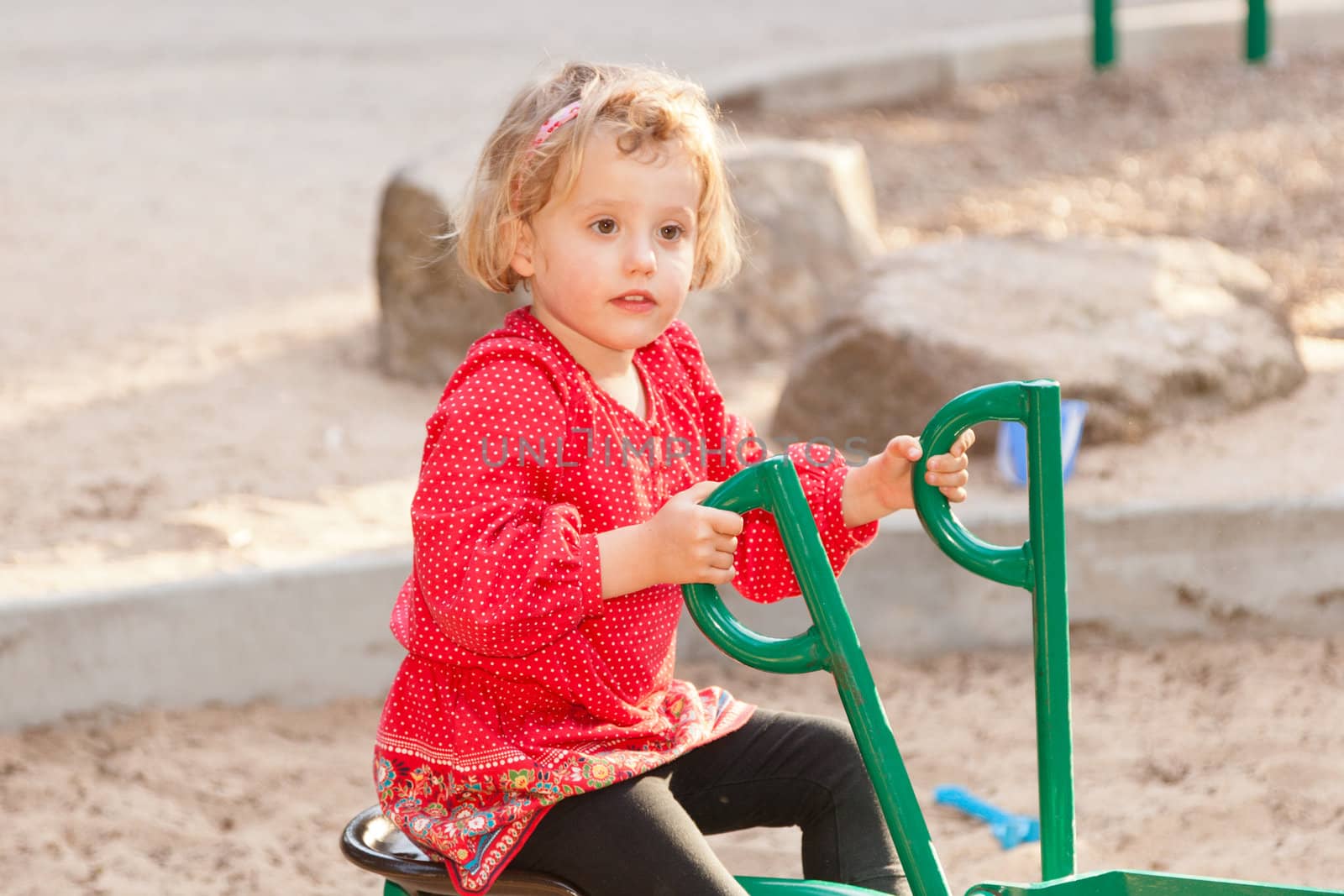 Having fun at playground in the park on Sunday afternoon.