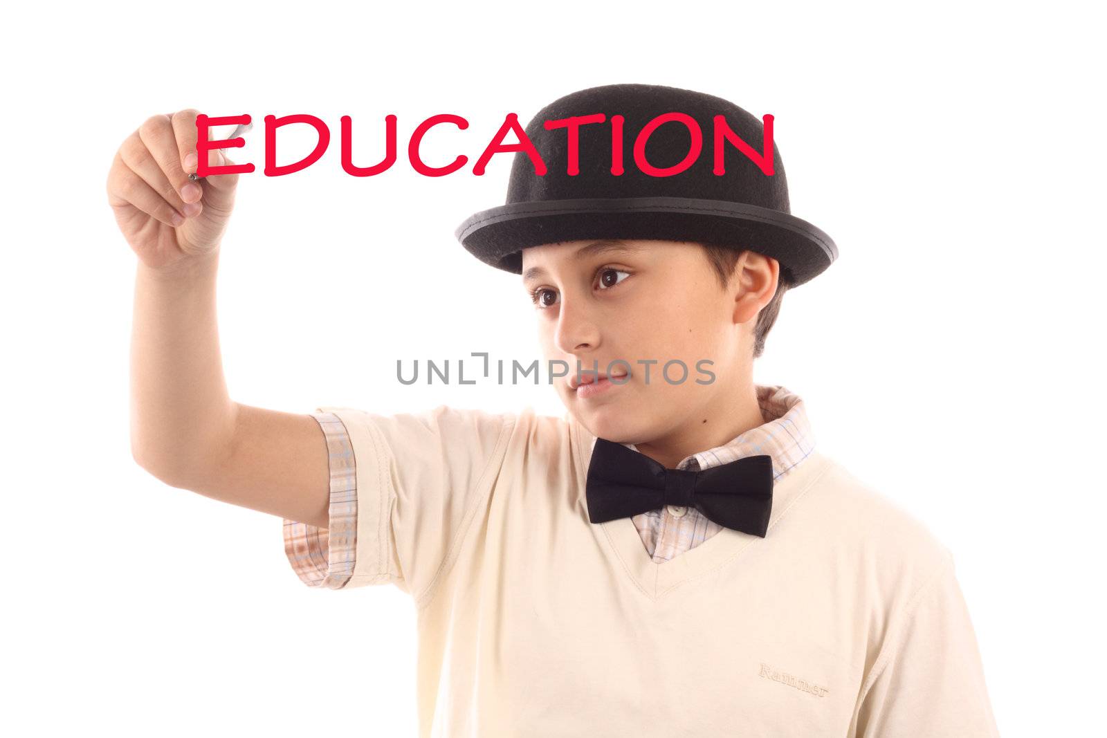 Young  boy with bowler hat written word education