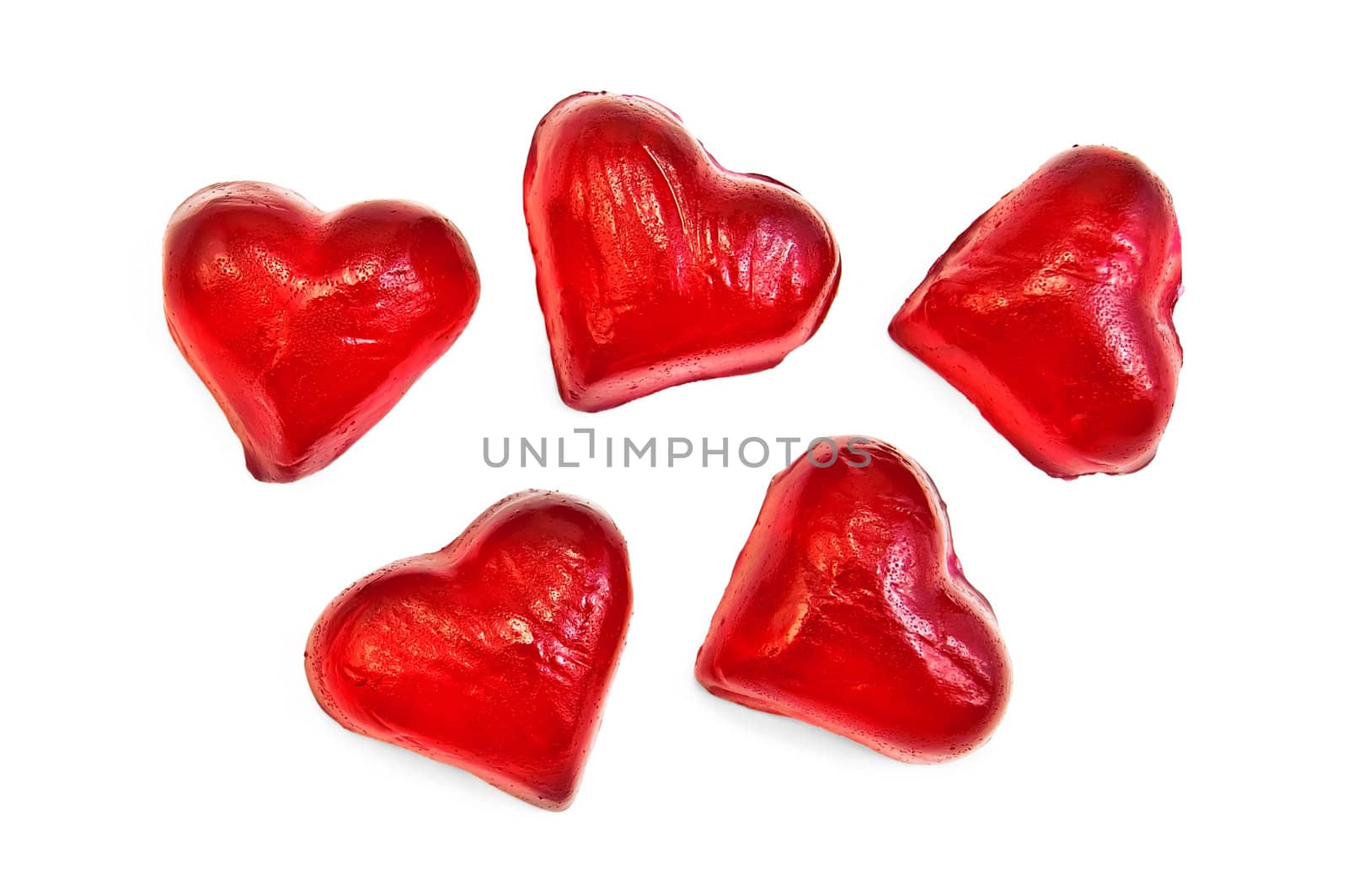 Red jelly in the form of hearts isolated on white background