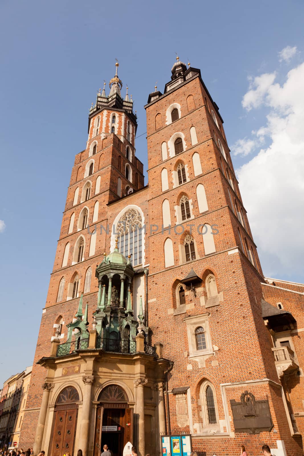 St. Mary's Basilica is a Brick Gothic church re-built in the 14th century (originally built in the early 13th century), adjacent to the Main Market Square in Kraków, Poland.