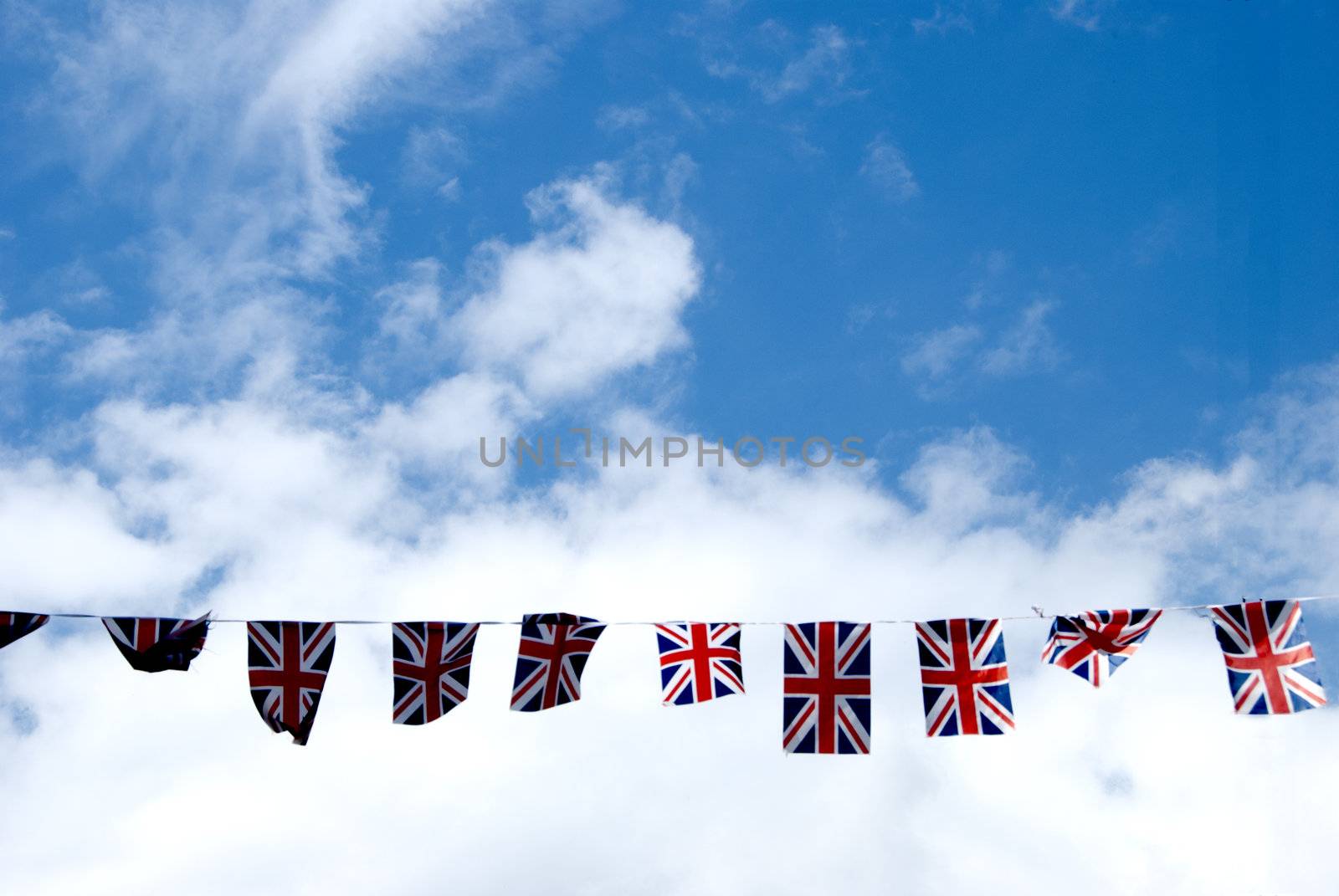 A String of Union Jack Flags across the main street in Haworth Yorkshire