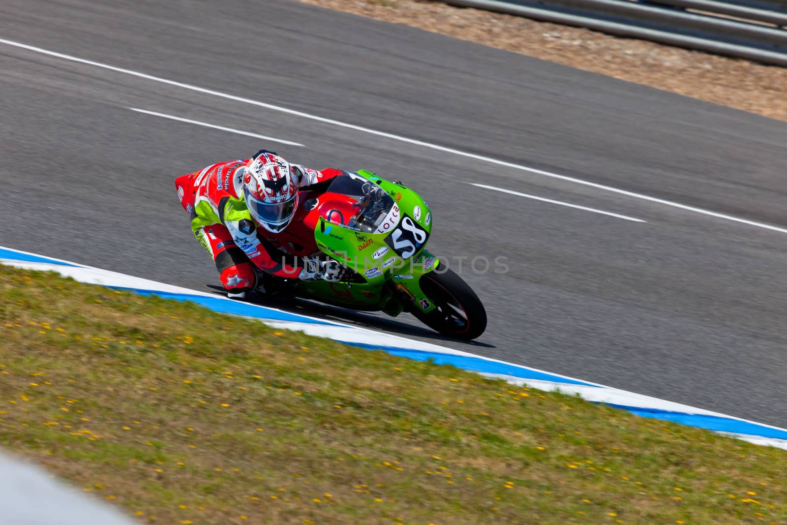 JEREZ DE LA FRONTERA, SPAIN - APR 17: 125cc motorcyclist Juanfran Guevara takes a curve in the CEV Championship race on April 17, 2011 in Jerez de la Frontera, Spain.