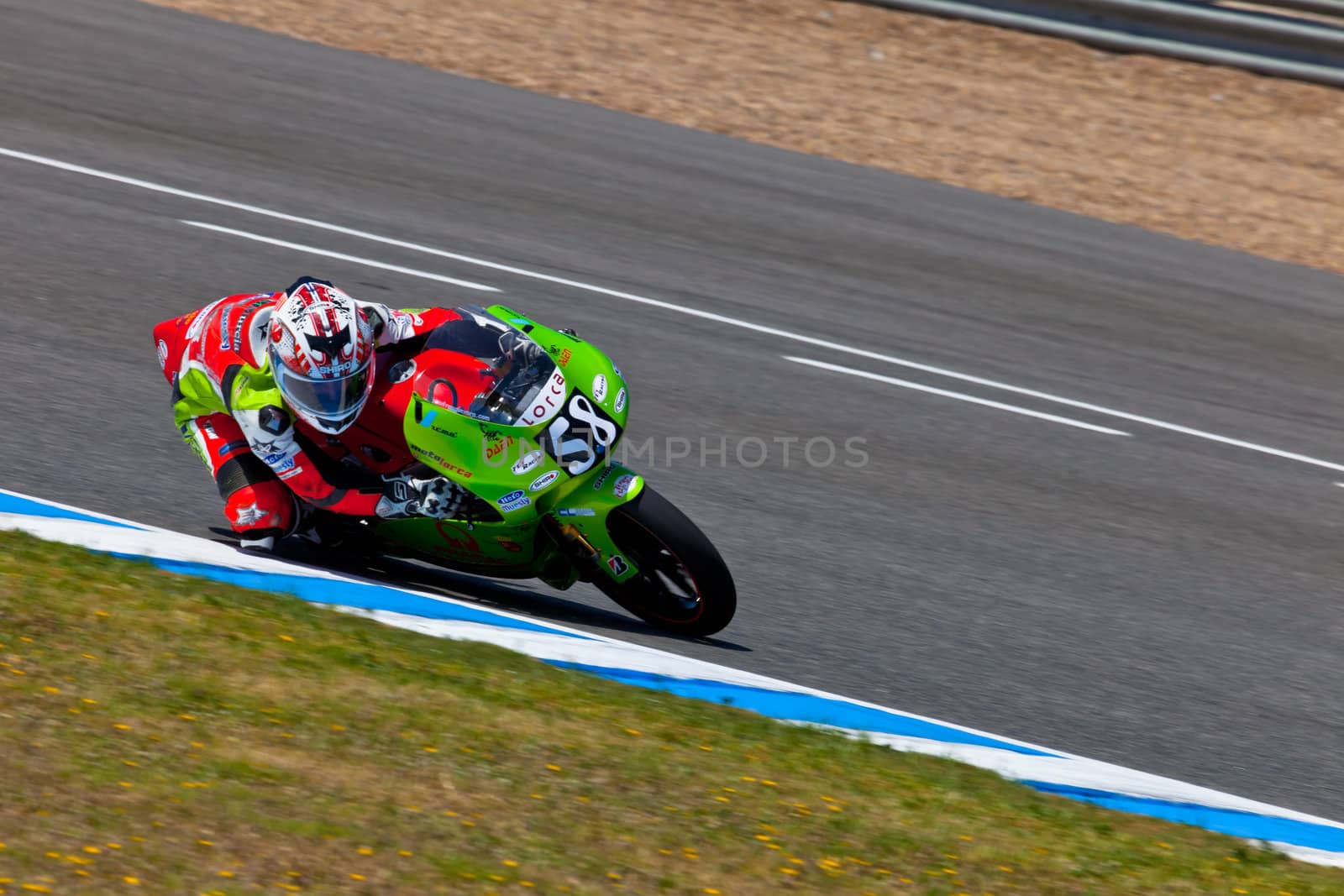 JEREZ DE LA FRONTERA, SPAIN - APR 17: 125cc motorcyclist Juanfran Guevara takes a curve in the CEV Championship race on April 17, 2011 in Jerez de la Frontera, Spain.