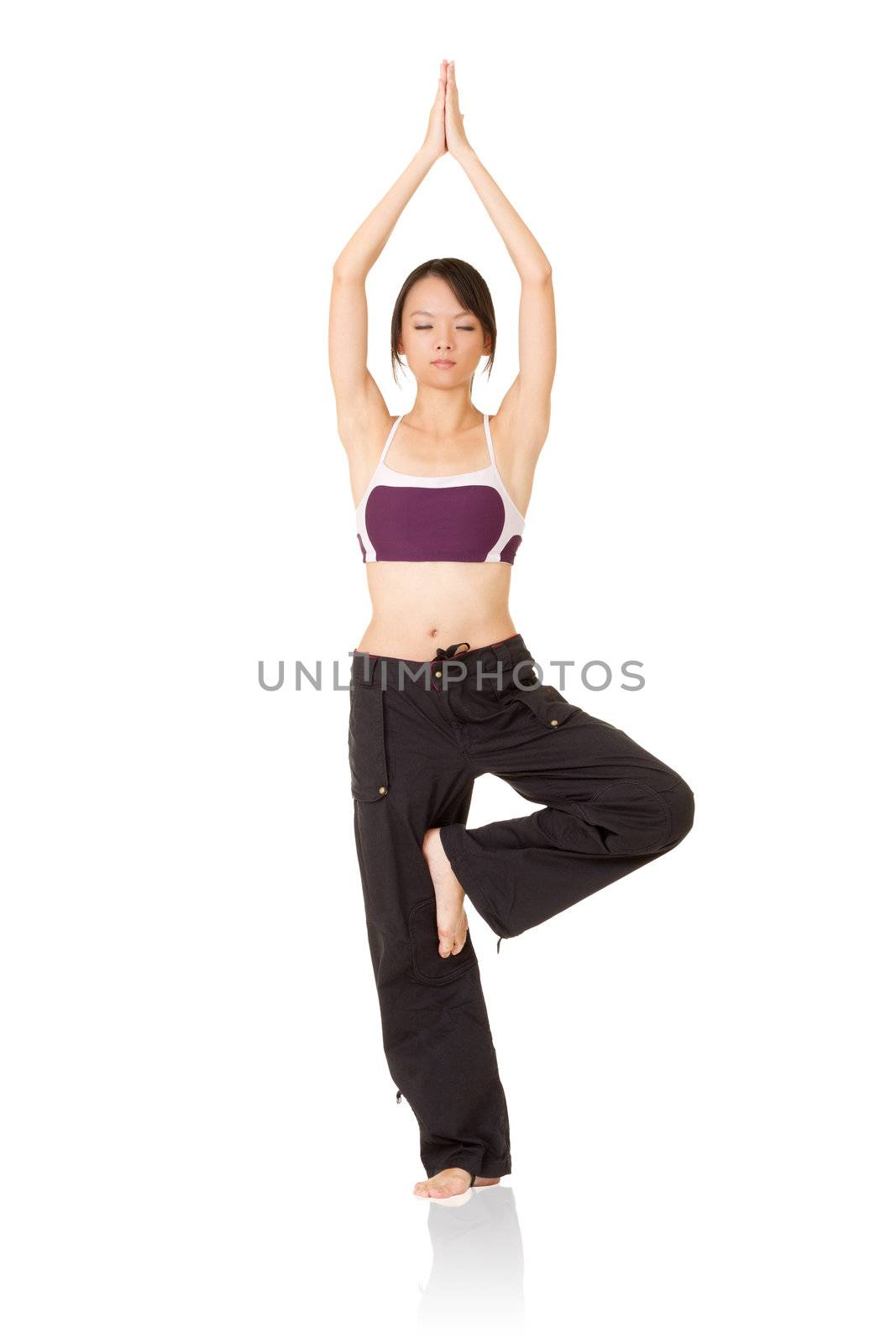 Professional yoga woman exercising, full length portrait isolated on white background.