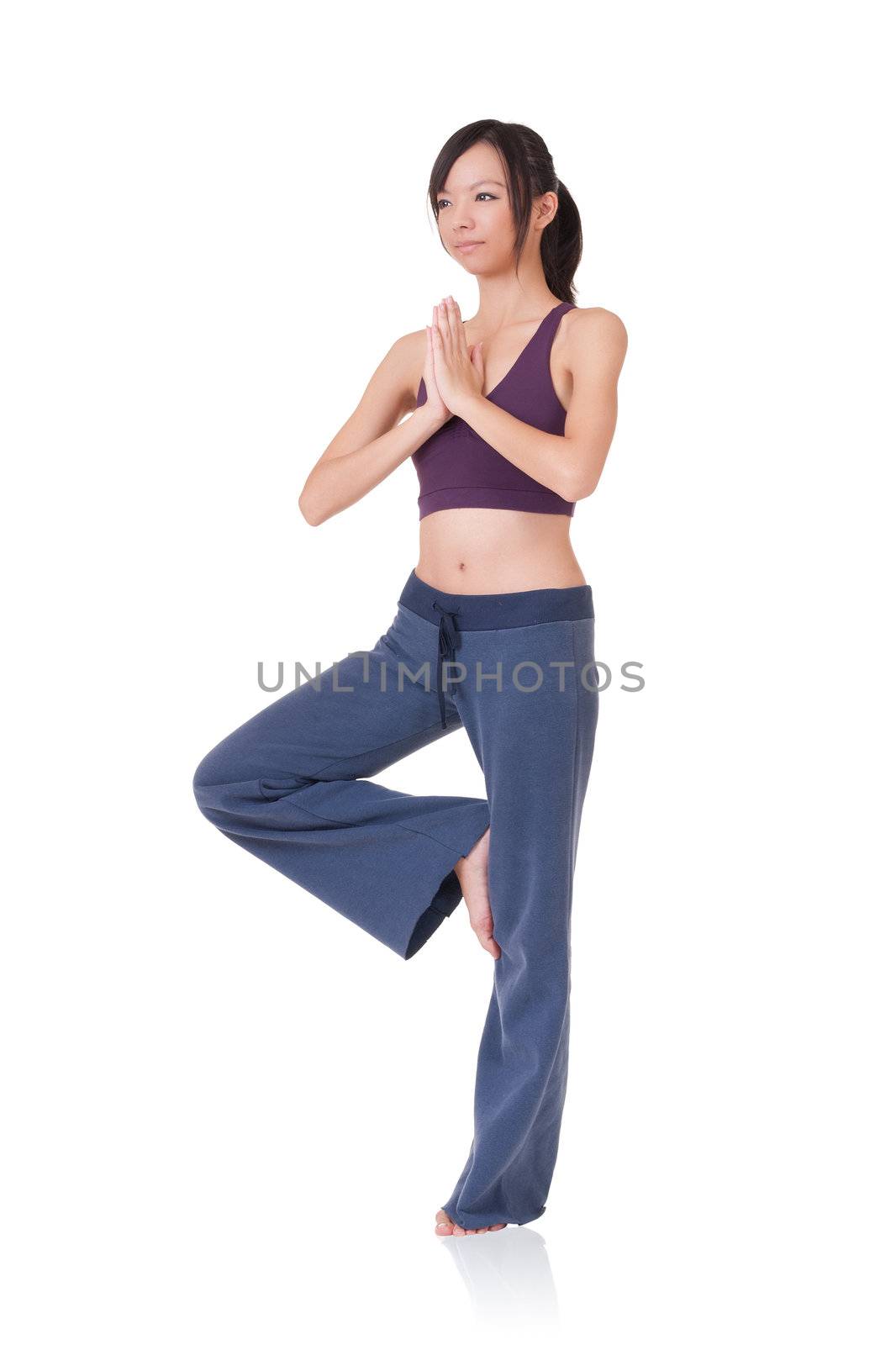 Professional yoga woman exercising, full length portrait isolated on white background.