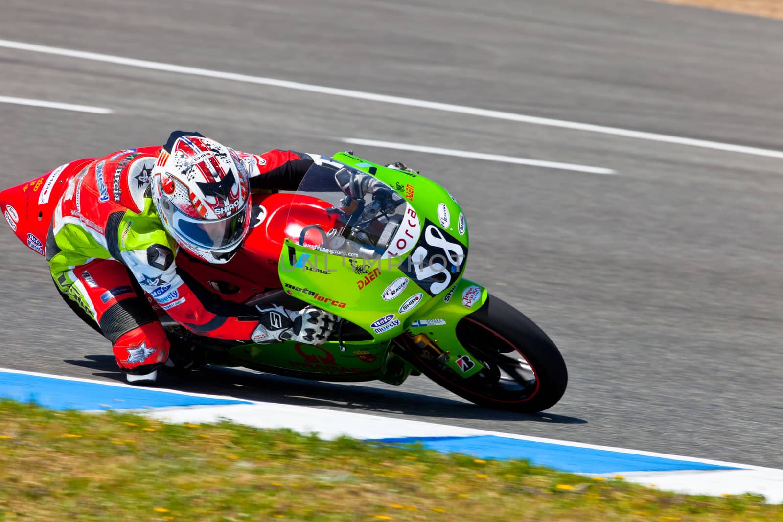 JEREZ DE LA FRONTERA, SPAIN - APR 17: 125cc motorcyclist Juanfran Guevara takes a curve in the CEV Championship race on April 17, 2011 in Jerez de la Frontera, Spain.