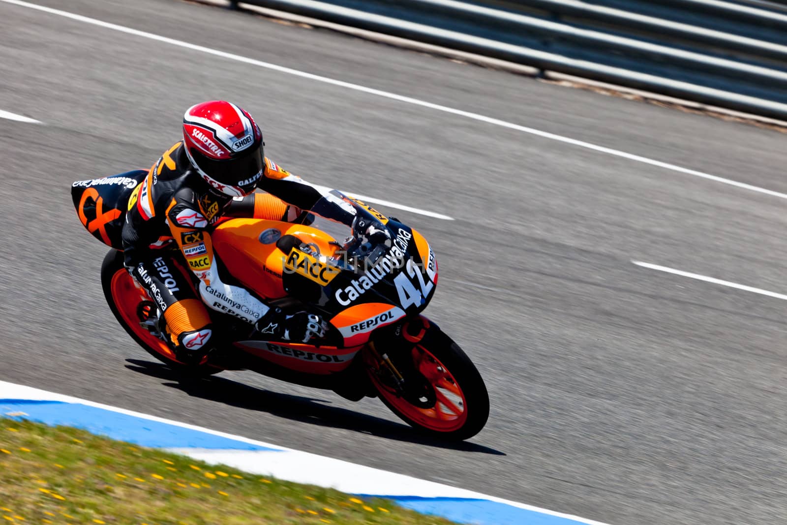 JEREZ DE LA FRONTERA, SPAIN - APR 17: 125cc motorcyclist Alex Rins takes a curve in the CEV Championship race on April 17, 2011 in Jerez de la Frontera, Spain.