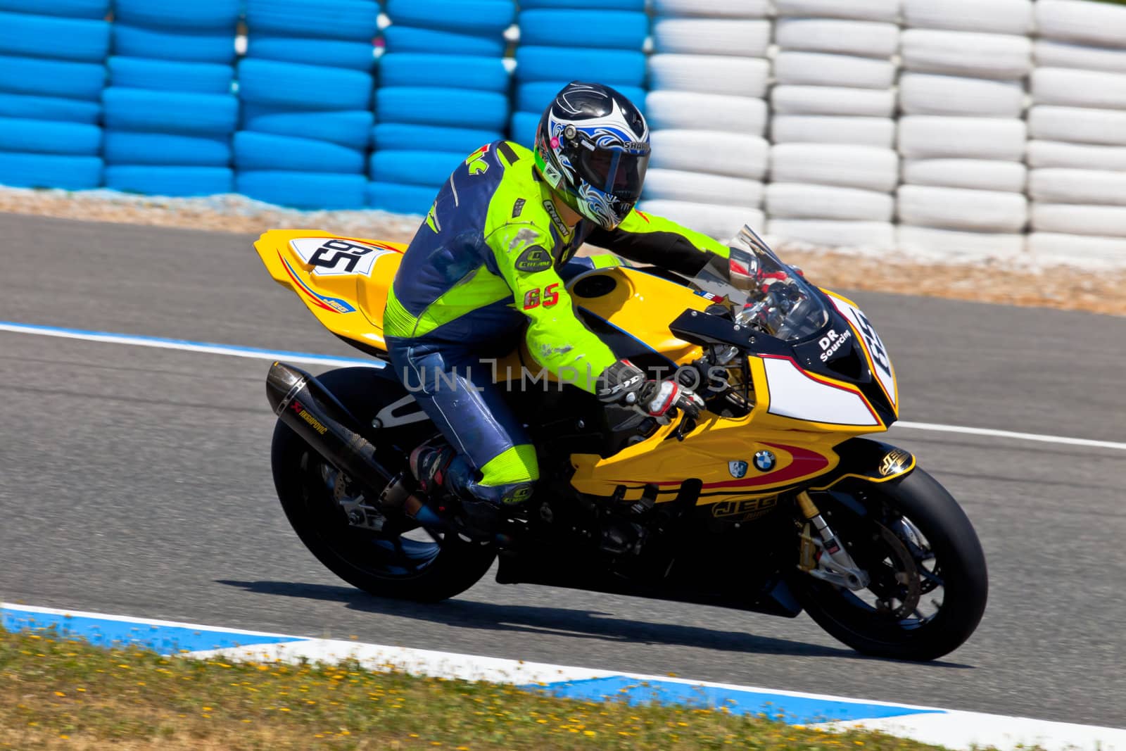 JEREZ DE LA FRONTERA, SPAIN - APR 17: Stock Extreme motorcyclist Juan Eric Gomez takes a curve in the CEV Championship race on April 17, 2011 in Jerez de la Frontera, Spain