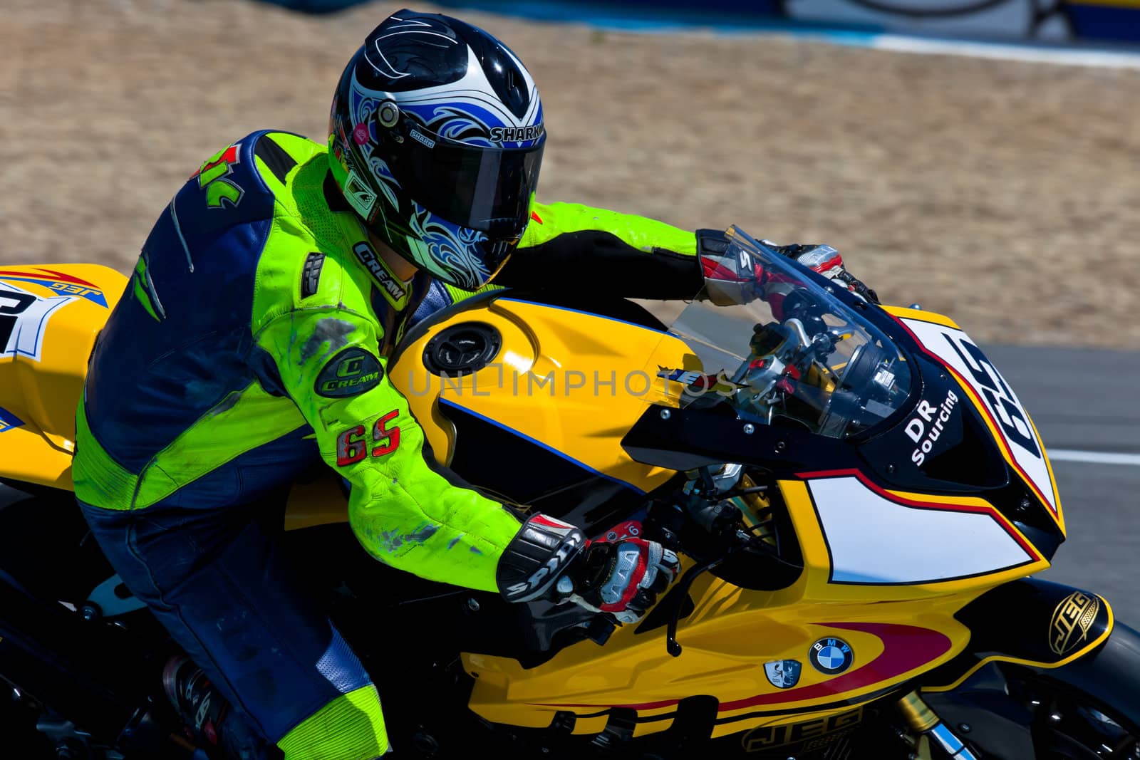 JEREZ DE LA FRONTERA, SPAIN - APR 17: Stock Extreme motorcyclist Juan Eric Gomez takes a curve in the CEV Championship race on April 17, 2011 in Jerez de la Frontera, Spain