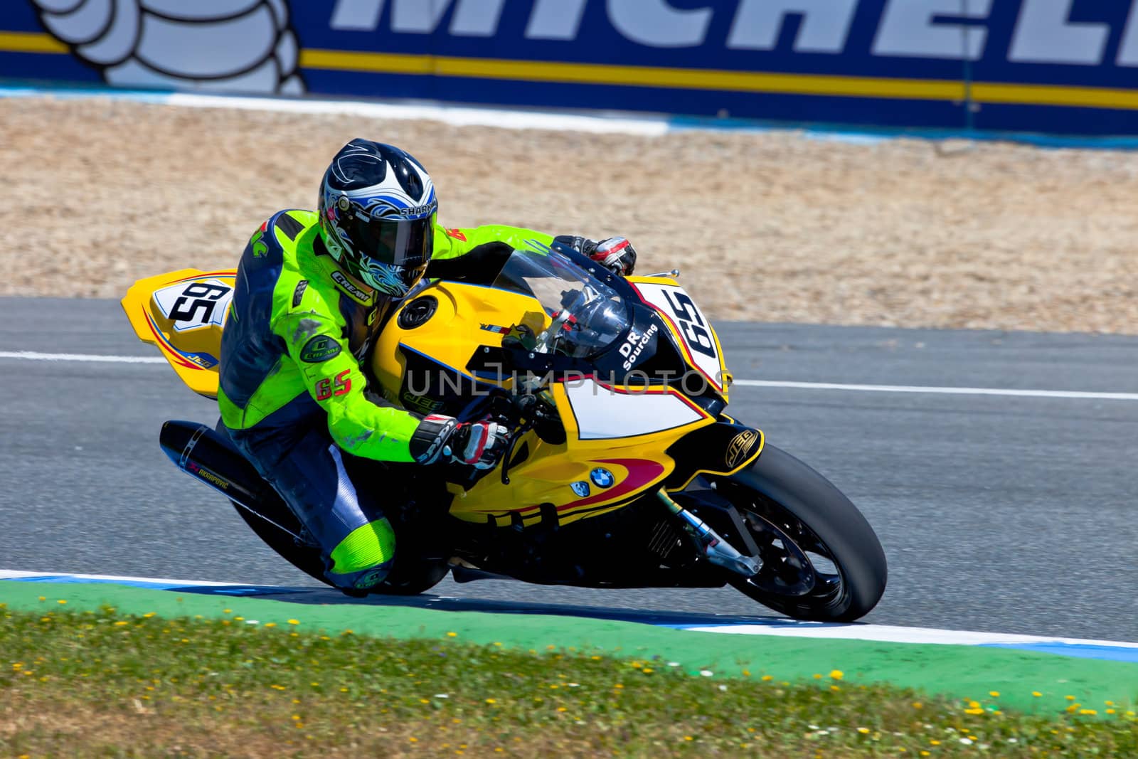 JEREZ DE LA FRONTERA, SPAIN - APR 17: Stock Extreme motorcyclist Juan Eric Gomez takes a curve in the CEV Championship race on April 17, 2011 in Jerez de la Frontera, Spain