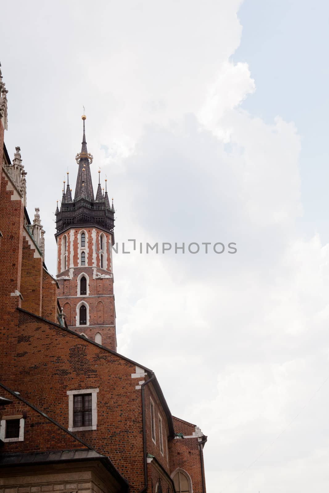 St. Mary's Basilica is a Brick Gothic church re-built in the 14th century (originally built in the early 13th century), adjacent to the Main Market Square in Kraków, Poland.