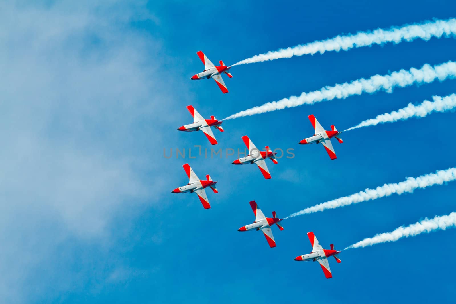 CADIZ, SPAIN-SEP 9: Aircrafts of the Patrulla Aguila taking part in a test on the 4th airshow of Cadiz on Sep 9, 2011, in Cadiz, Spain
