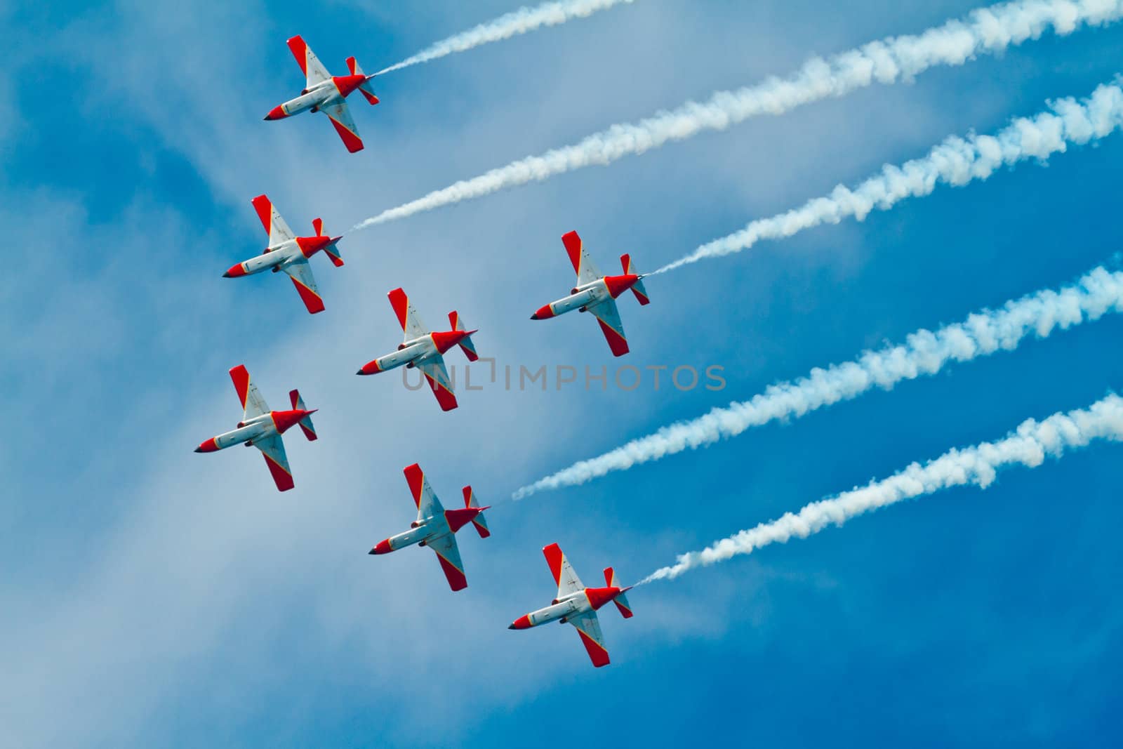 CADIZ, SPAIN-SEP 9: Aircrafts of the Patrulla Aguila taking part in a test on the 4th airshow of Cadiz on Sep 9, 2011, in Cadiz, Spain