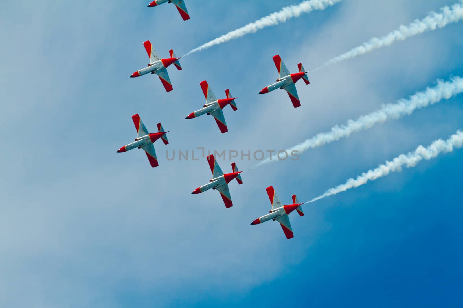 CADIZ, SPAIN-SEP 9: Aircrafts of the Patrulla Aguila taking part in a test on the 4th airshow of Cadiz on Sep 9, 2011, in Cadiz, Spain
