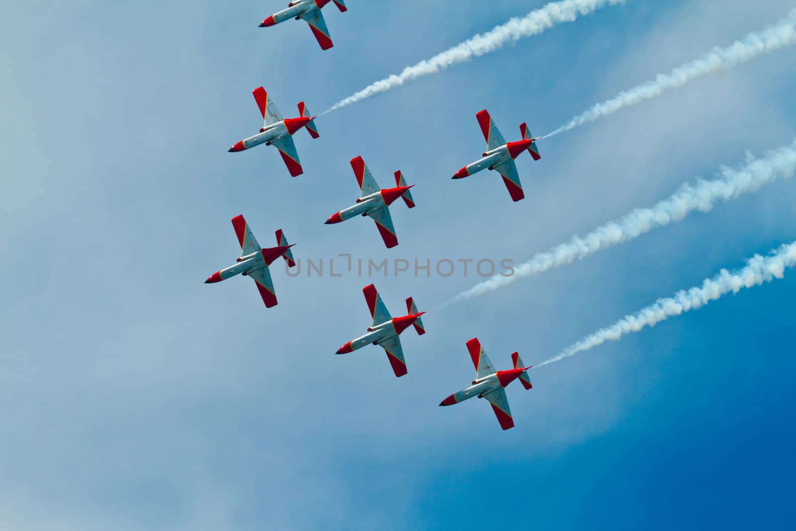 CADIZ, SPAIN-SEP 9: Aircrafts of the Patrulla Aguila taking part in a test on the 4th airshow of Cadiz on Sep 9, 2011, in Cadiz, Spain