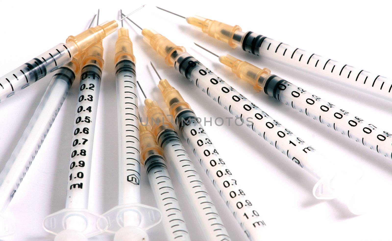 Syringes on white background
