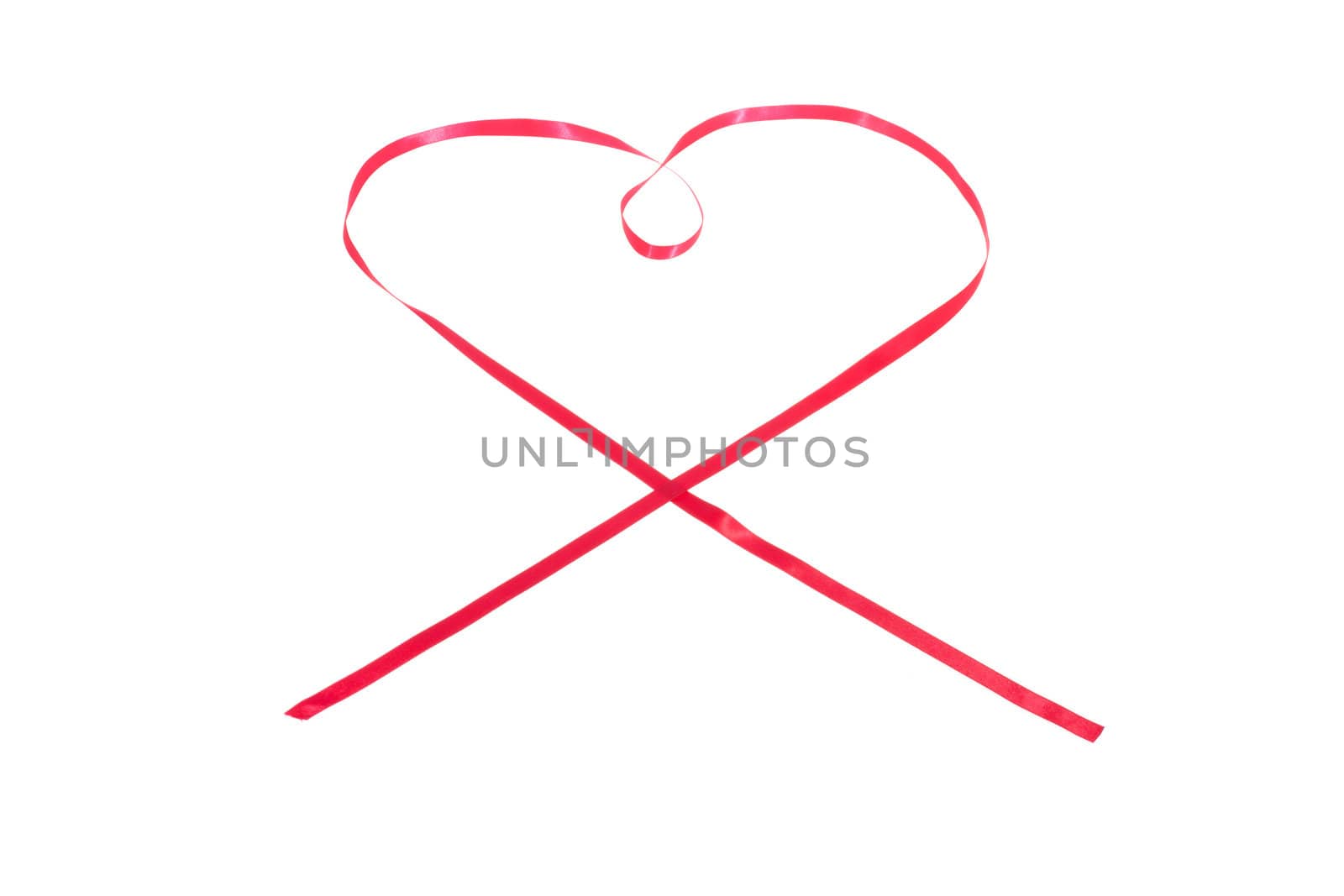 Red heart from ribbon, photo on the white background