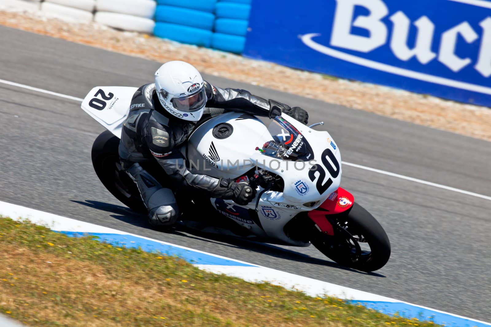 JEREZ DE LA FRONTERA, SPAIN - APR 17: Stock Extreme motorcyclist Juan Alonso takes a curve and move forward to Felix Rodriguez in the CEV Championship race on April 17, 2011 in Jerez de la Frontera, Spain