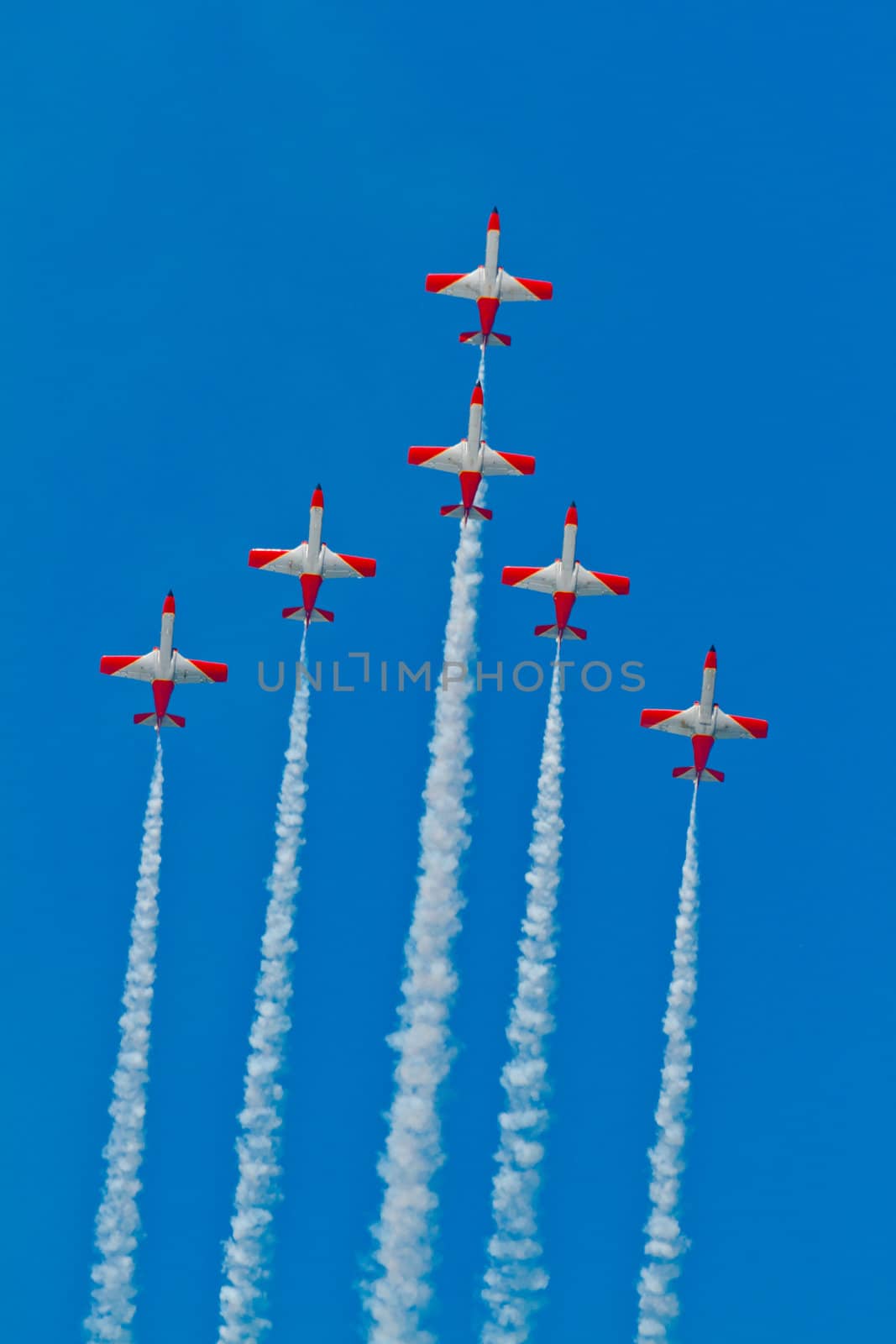 CADIZ, SPAIN-SEP 9: Aircrafts of the Patrulla Aguila taking part in a test on the 4th airshow of Cadiz on Sep 9, 2011, in Cadiz, Spain