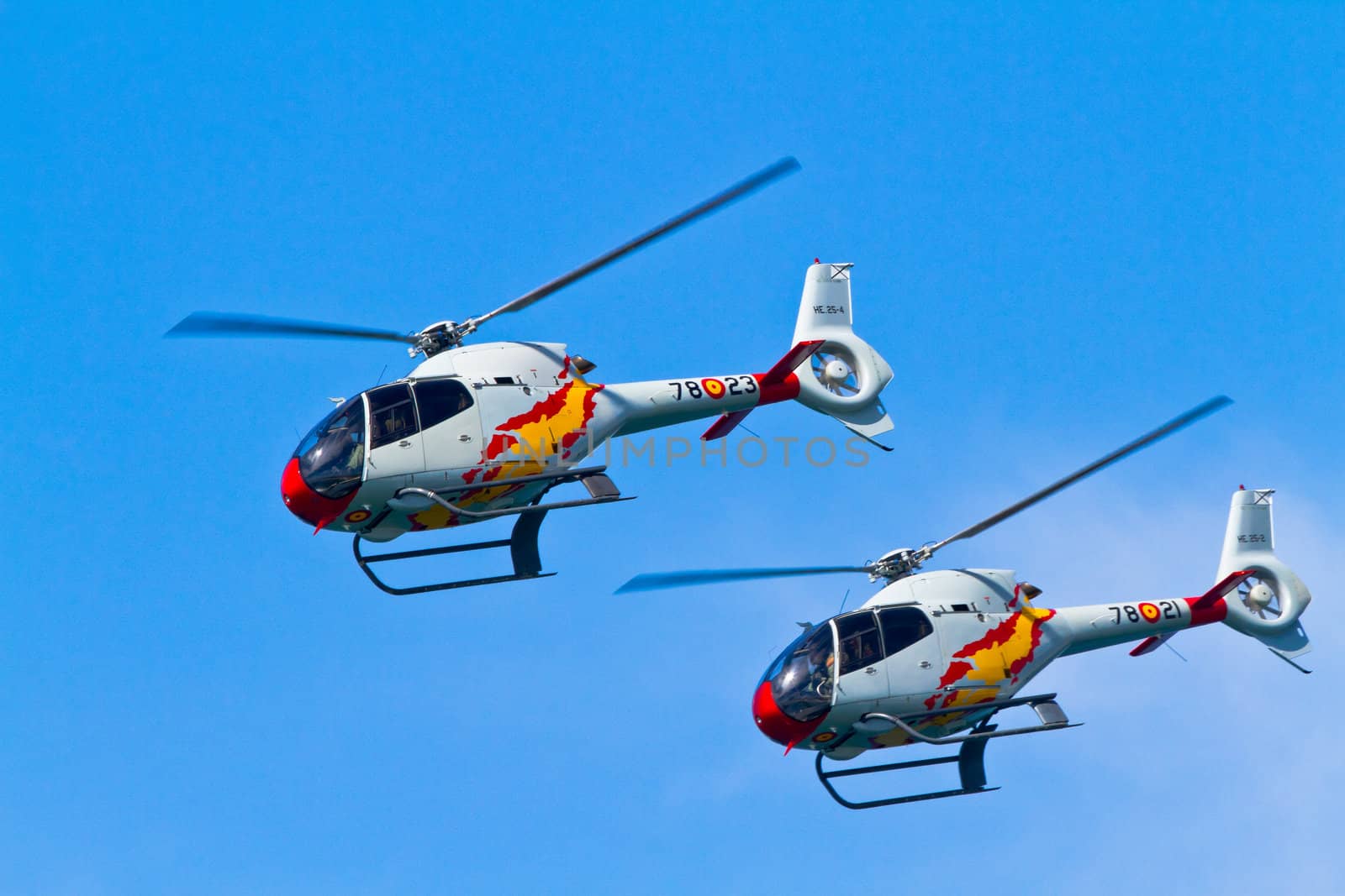 CADIZ, SPAIN-SEP 09: Helicopters of the Patrulla Aspa taking part in an test on the 4th airshow of Cadiz on Sep 09, 2011, in Cadiz, Spain