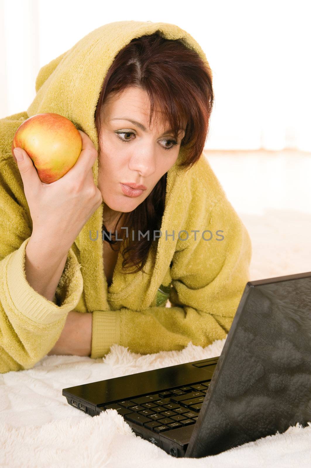 woman with laptop and apple by uriy2007