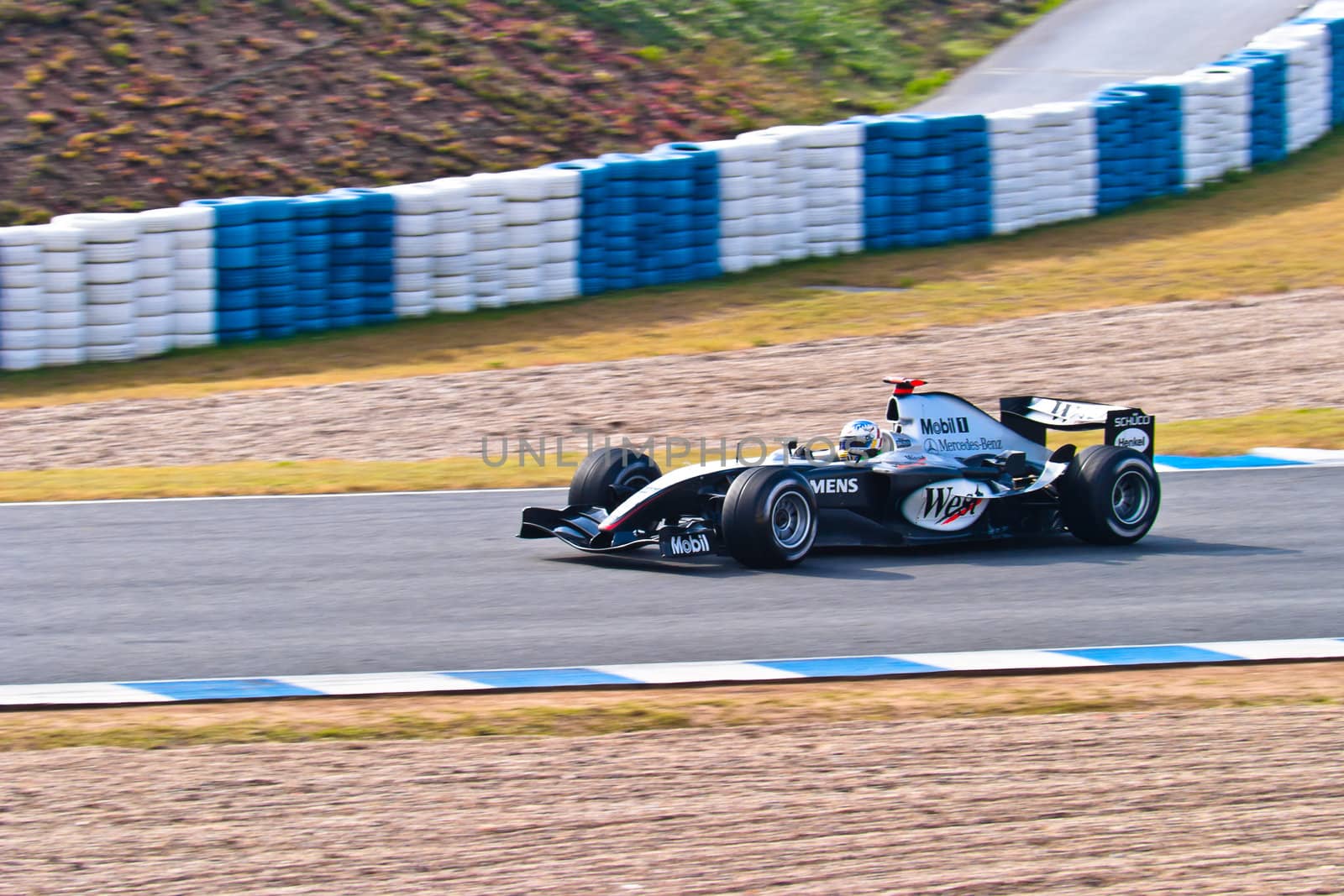 JEREZ DE LA FRONTERA, SPAIN - DEC 04: Alex Wurz of McLaren Mercedes F1 races during a training session on December 04, 2004, in Jerez de la Frontera, Spain