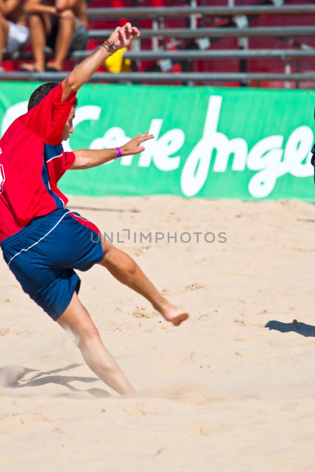 CADIZ, SPAIN -  JUL 30:  Unknown player of the team of Gijon playing the Spanish Championship of Beach Soccer on Jul 30, 2005 on the beach of La Victoria in Cadiz, Spain