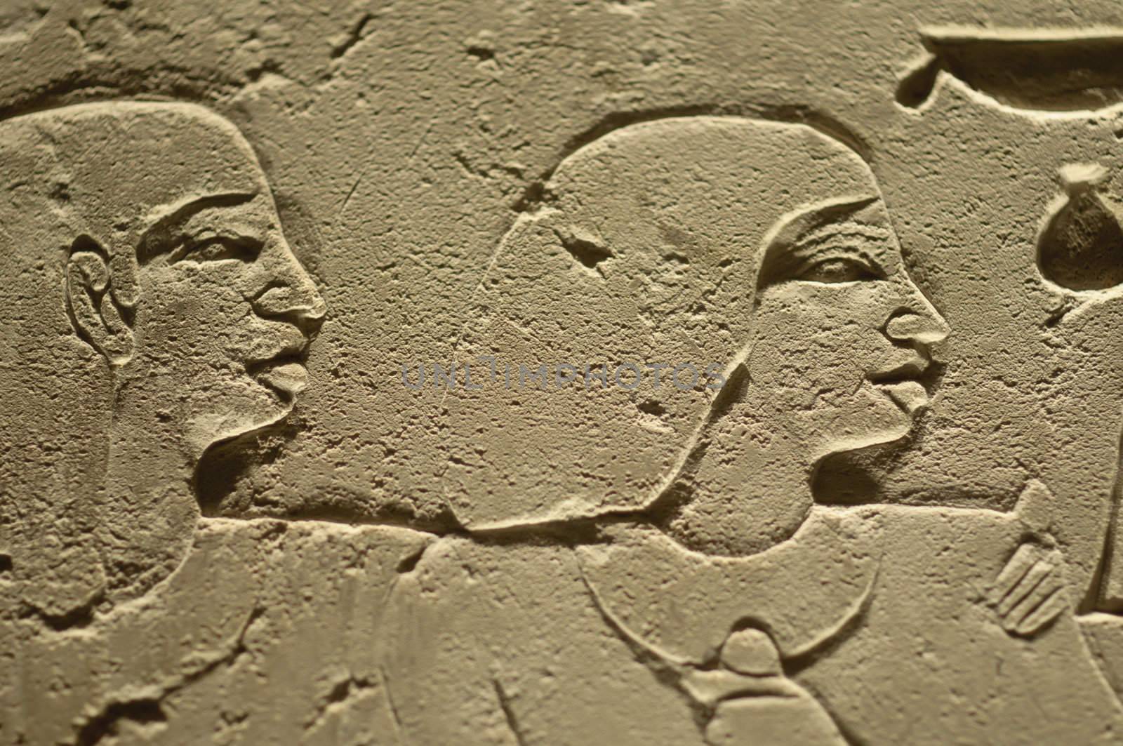 Ancient Egypt hieroglyph writing and sign on stone wall